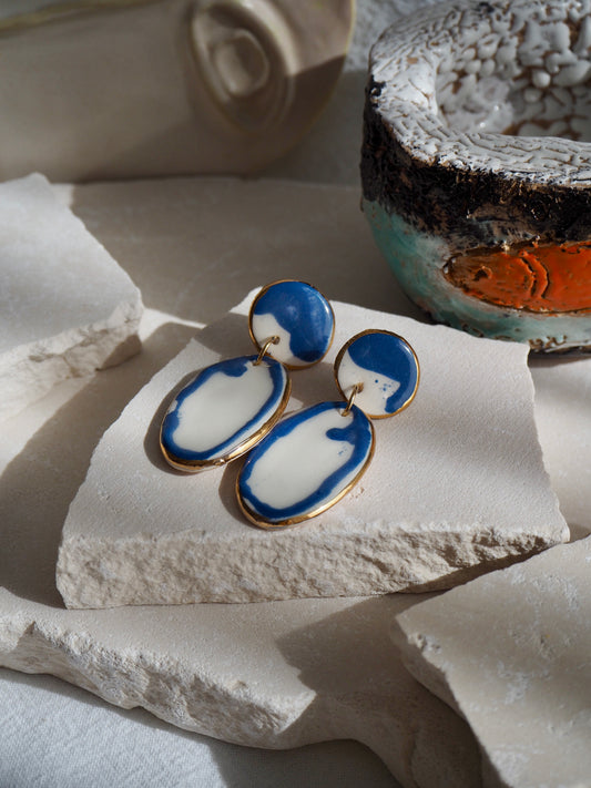 Royal Blue Rim & White Porcelain Earrings coloured using ceramic stain under clear glaze for glossy look