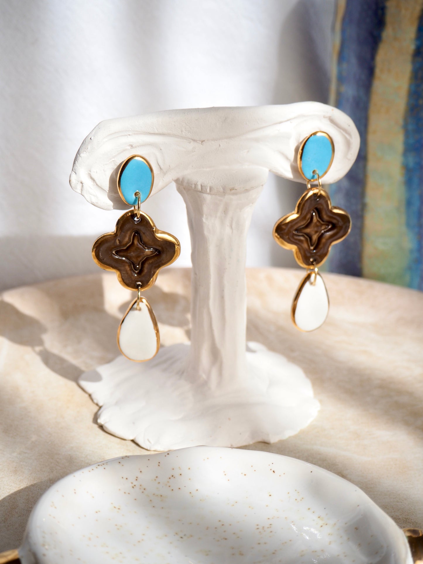 “A Feast for your Eyes” Handmade Porcelain Earrings in Blue, Brown and White glossy coloured glazes with 24k gold lustre details.