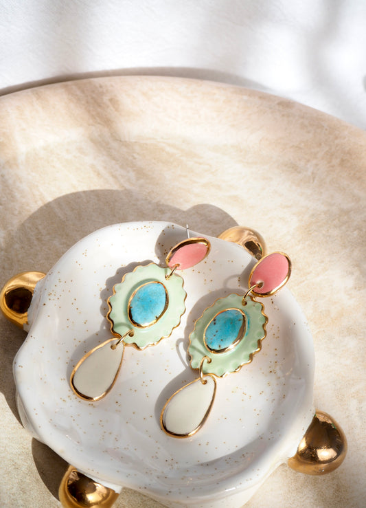 One of a kind Porcelain Earrings coloured with pink , aqua, light green and white glossy glazes with 24k lustre rims
