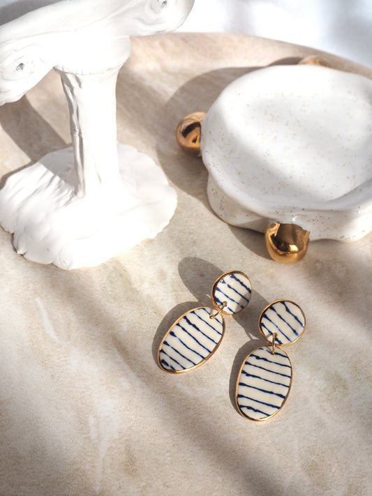 Stripes on Porcelain Earrings in “Royal Blue” ceramic stain under clear glaze for glossy look 24k gold rims