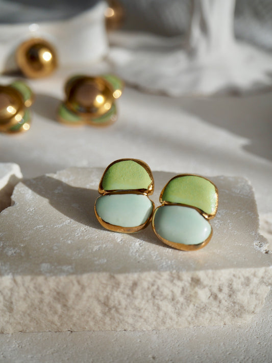 “il Quadrato Coccinella” Small Handmade Porcelain Studs coloured with Light Green&Blue matt glossy glazes with 24k Gold lustre details