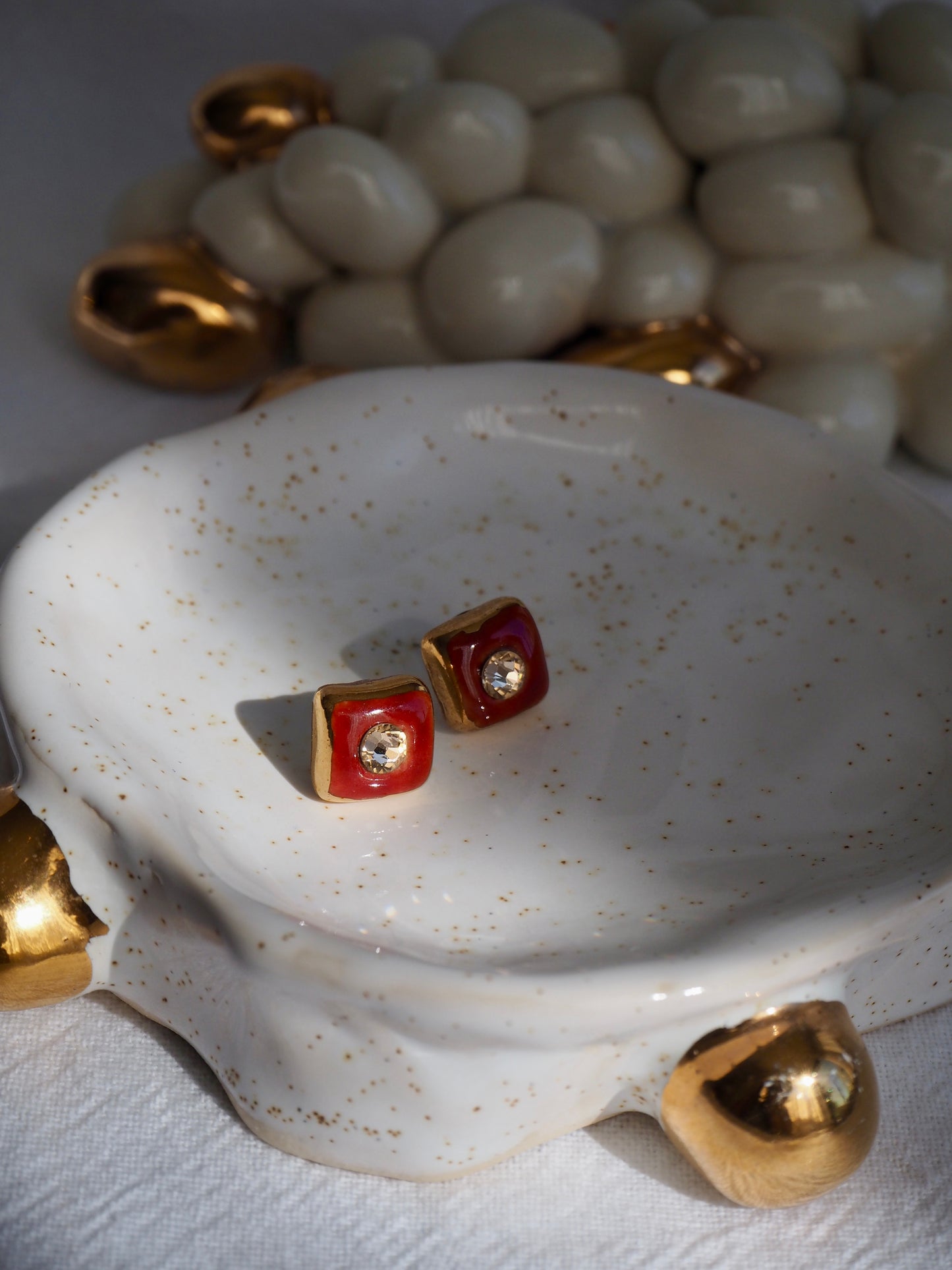 “Supernova” Brown Small Square Handmade Porcelain Studs with 24k Gold lustre rims and Swarovskis Crystal.