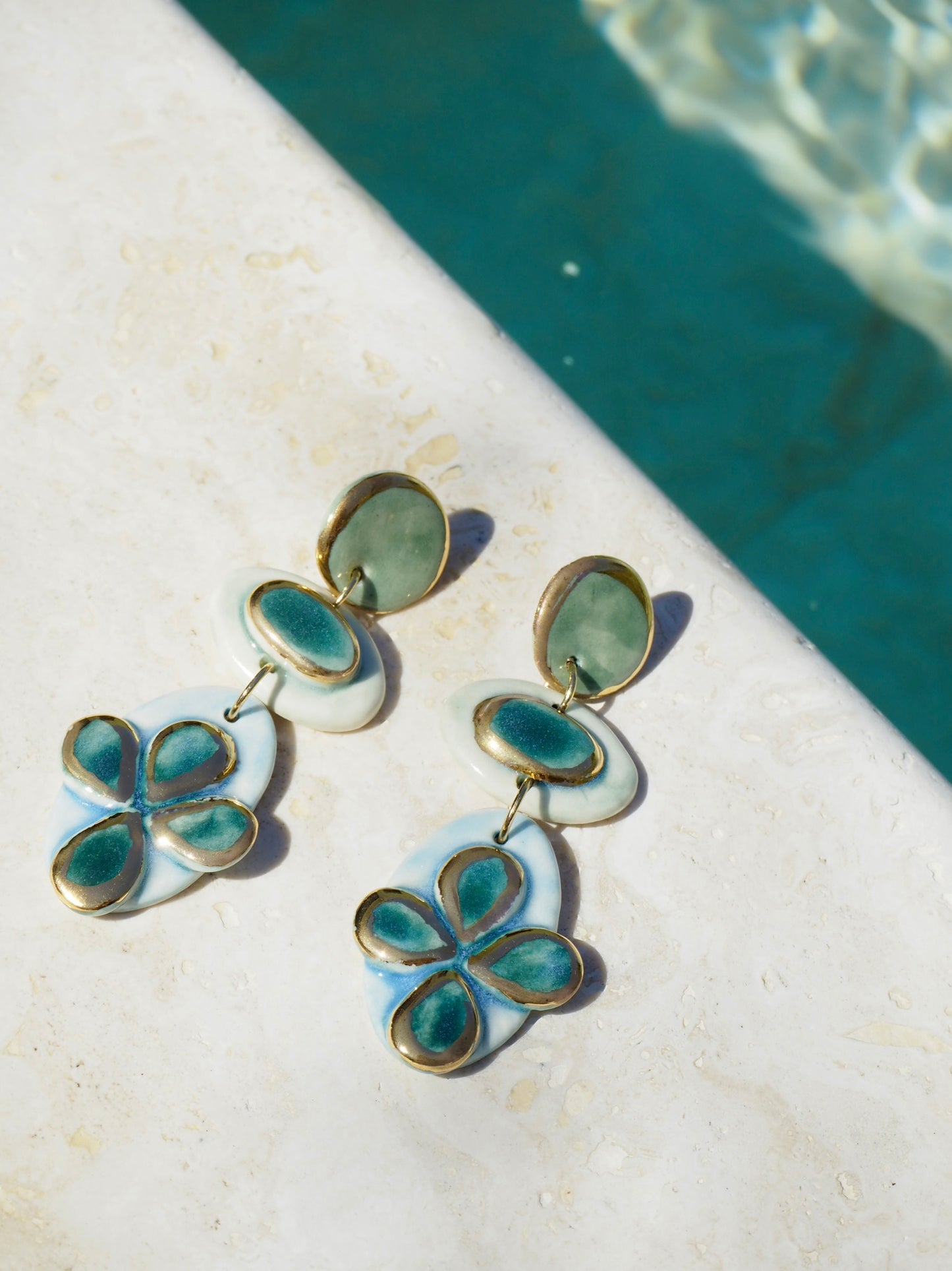Fresco Charm Porcelain Earrings in Dreamy Greens coloured underglazes covered in clear glossy glaze