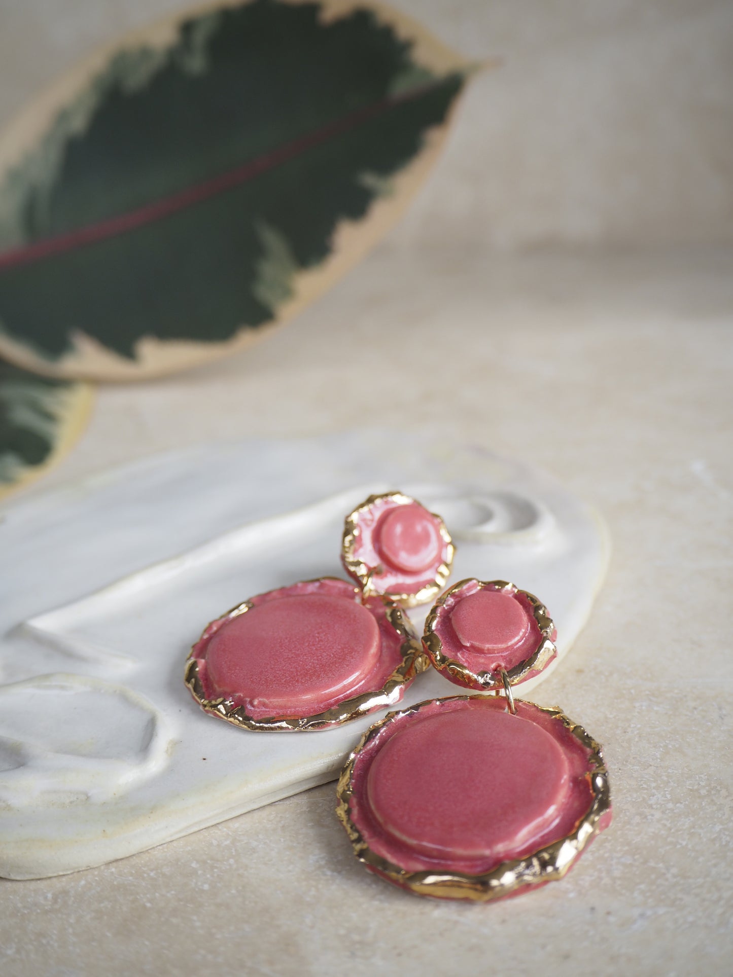 Femminilità Porcelain Earrings in “Raspberry Mist” coloured glossy glaze with 24k Gold lustre textured rims