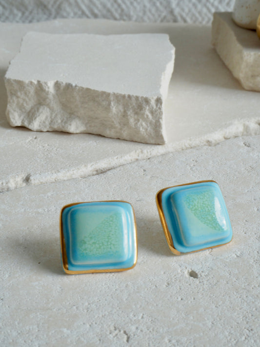 “il Quadrato” Medium Handmade Porcelain Studs coloured with “Sky Blue&Sage” glossy glazes with 24k Gold lustre details