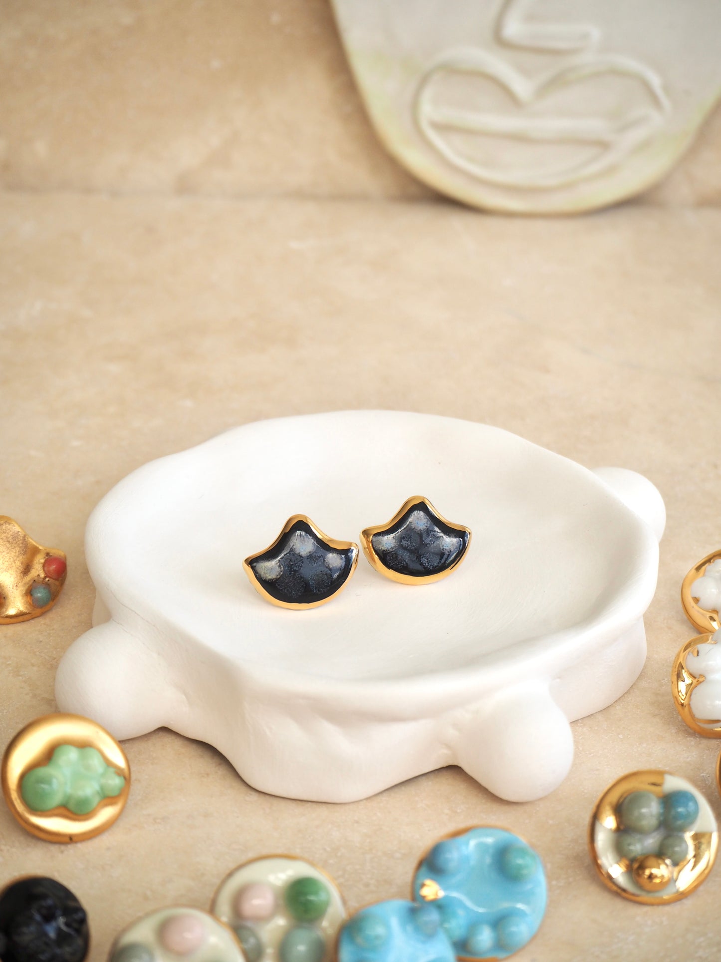 the Jocelyn collection “Conchiglia Black”handmade Porcelain Earrings with 24k gold lustre details