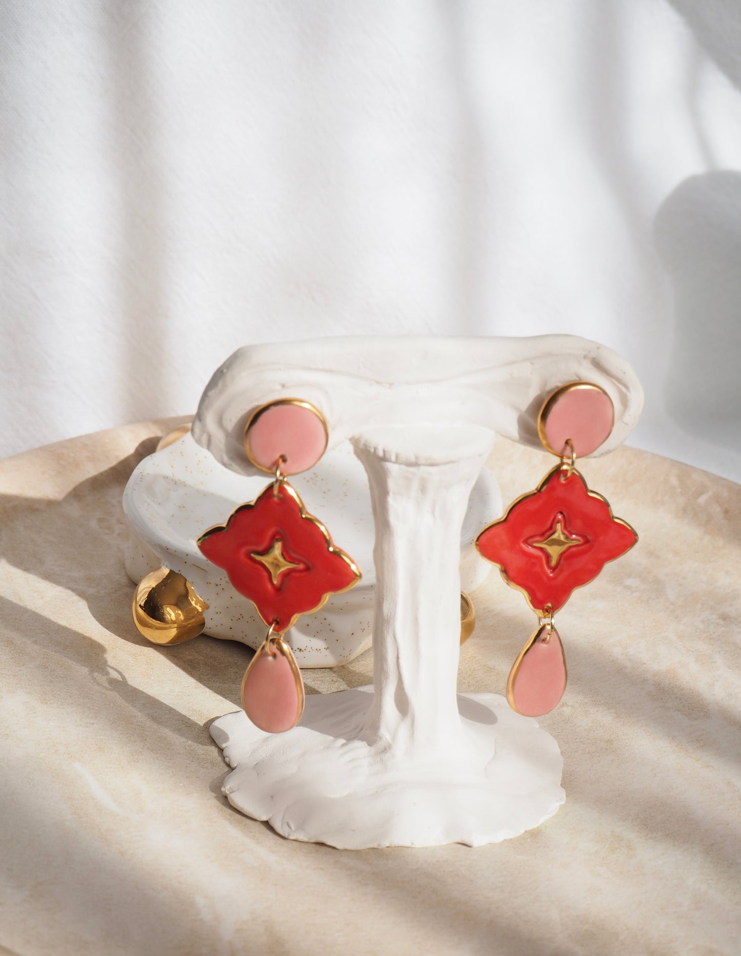 “A Feast for your Eyes” Handmade Porcelain Earrings in Cherry Red coloured glaze with 24k gold lustre details.