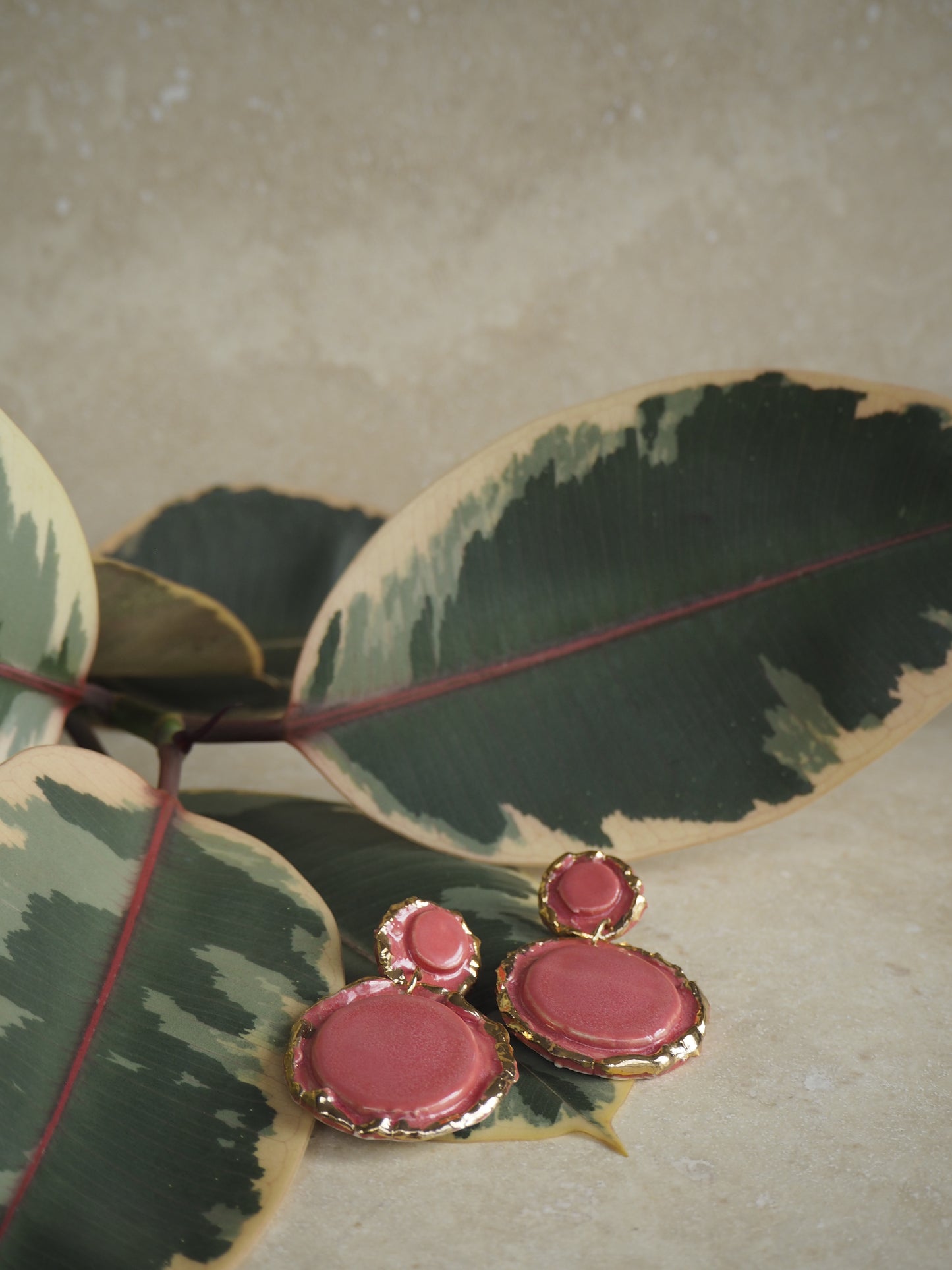 Femminilità Porcelain Earrings in “Raspberry Mist” coloured glossy glaze with 24k Gold lustre textured rims