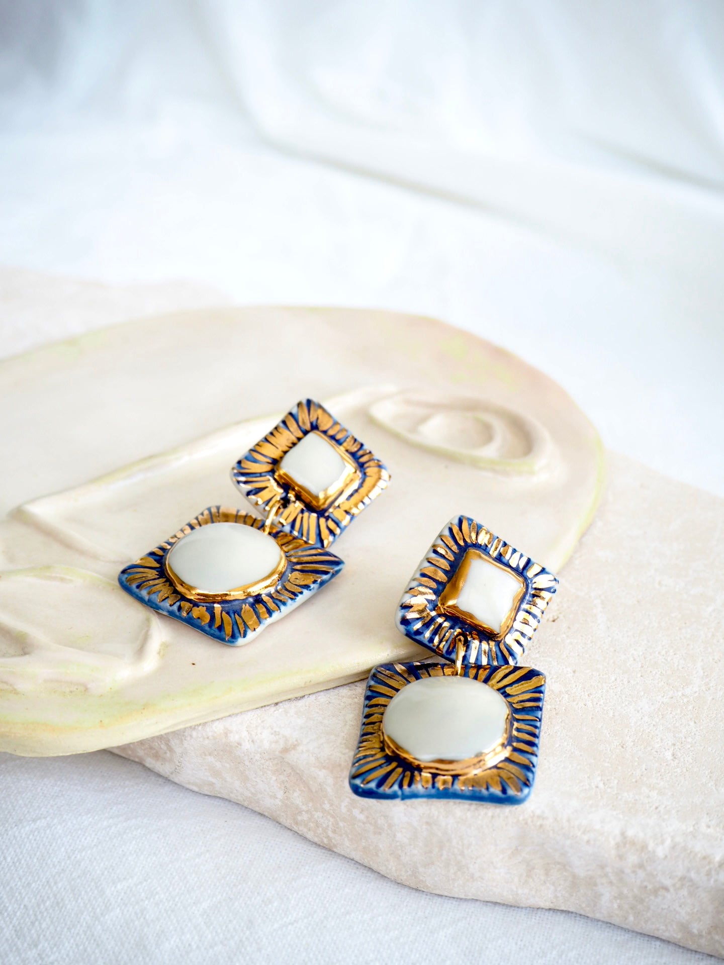 Sol Quadrado Blue and white Porcelain Earrings in “Royal Blue” ceramic stain under clear glaze for glossy look