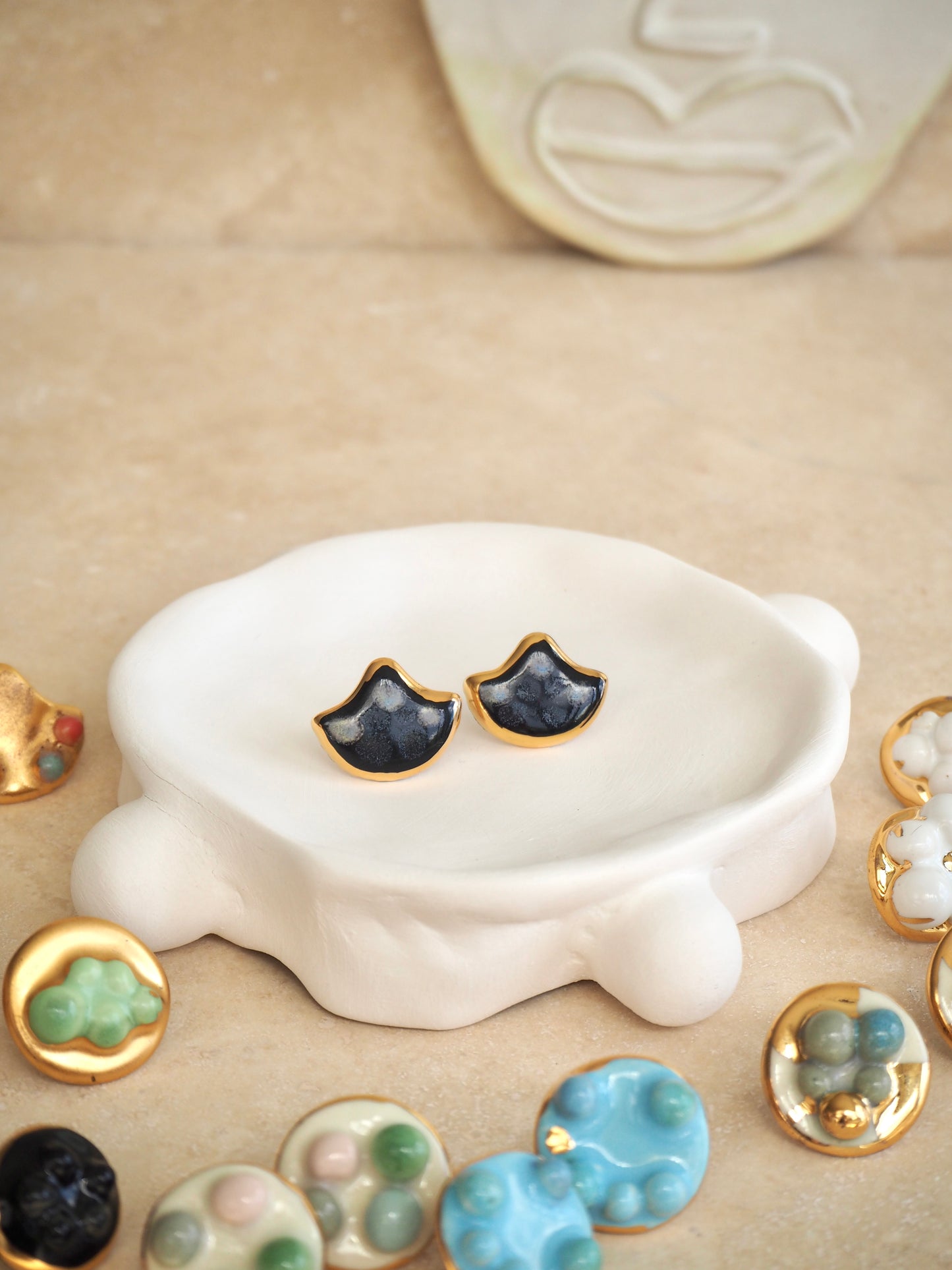 the Jocelyn collection “Conchiglia Black”handmade Porcelain Earrings with 24k gold lustre details