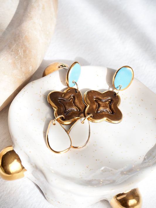 “A Feast for your Eyes” Handmade Porcelain Earrings in Blue, Brown and White glossy coloured glazes with 24k gold lustre details.