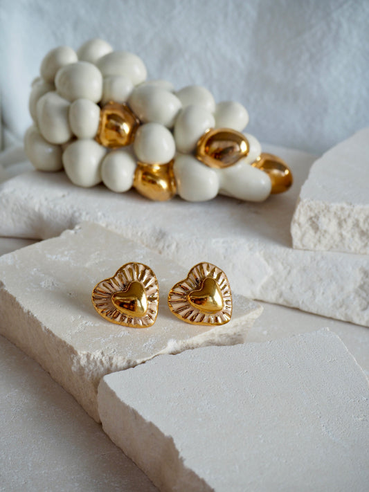 Small Handmade Porcelain Heart Stud Earrings coloured with Glossy Parchment coloured underglaze with 24k Gold lustre details and Gold center Star
