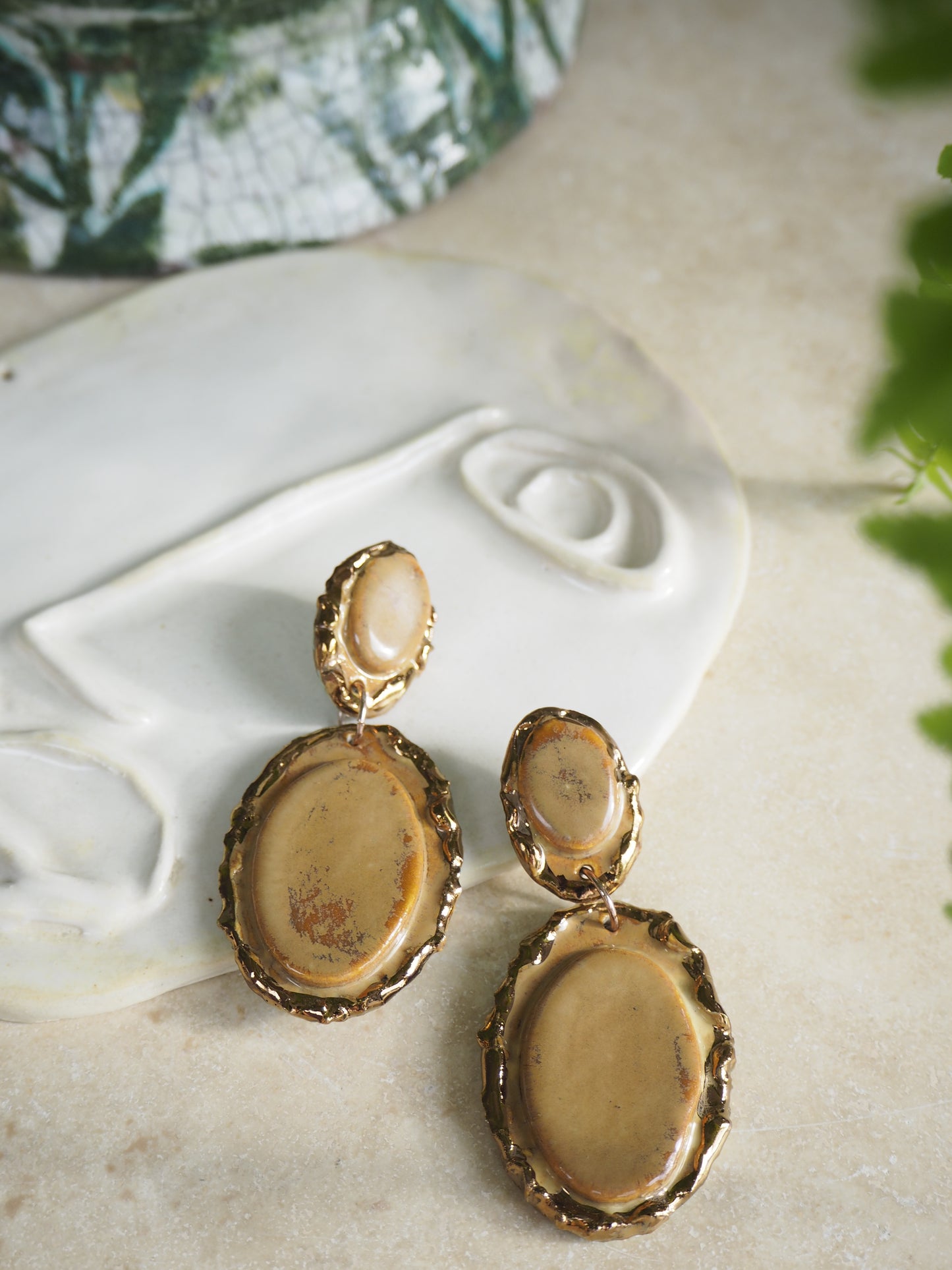 Femminilità Porcelain Earrings in Caramel coloured glaze with Copper lustre textured rims