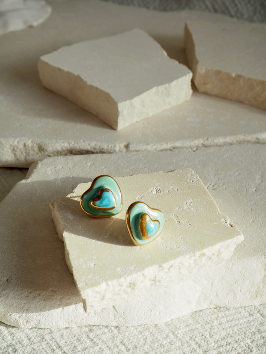 Small Handmade Porcelain Heart Stud coloured with “Blues and Greens” glossy glazes with 24k Gold lustre details