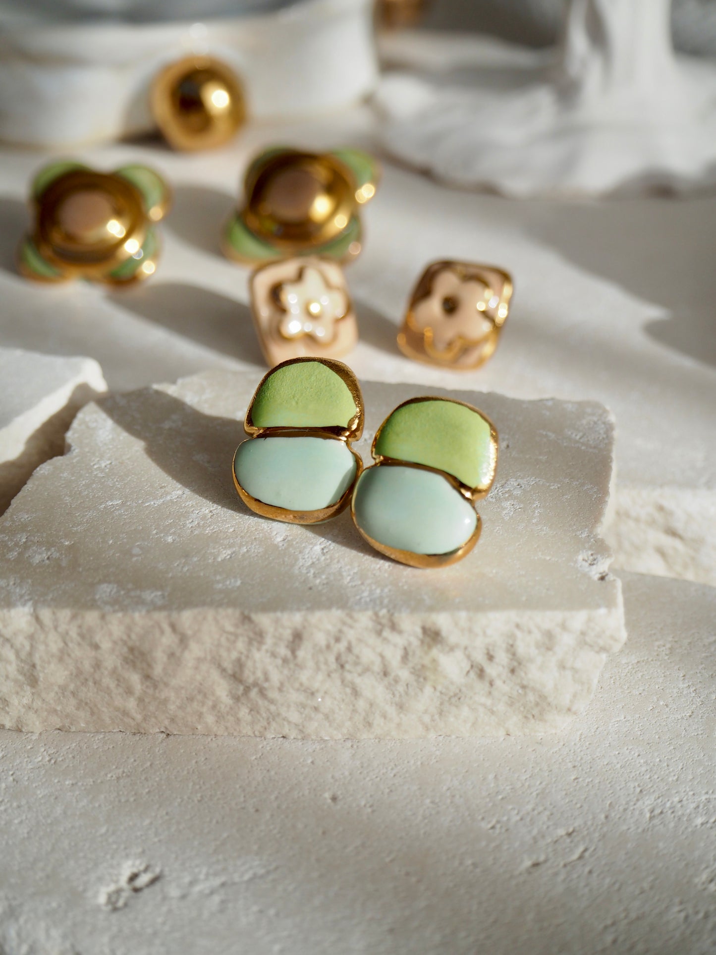 “il Quadrato Coccinella” Small Handmade Porcelain Studs coloured with Light Green&Blue matt glossy glazes with 24k Gold lustre details