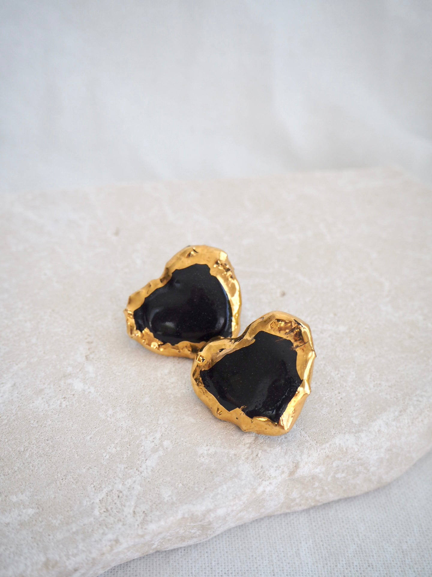 Porcelain Heart Earrings in Black coloured underglaze covered in glossy clear glaze & 24k Gold lustre rim