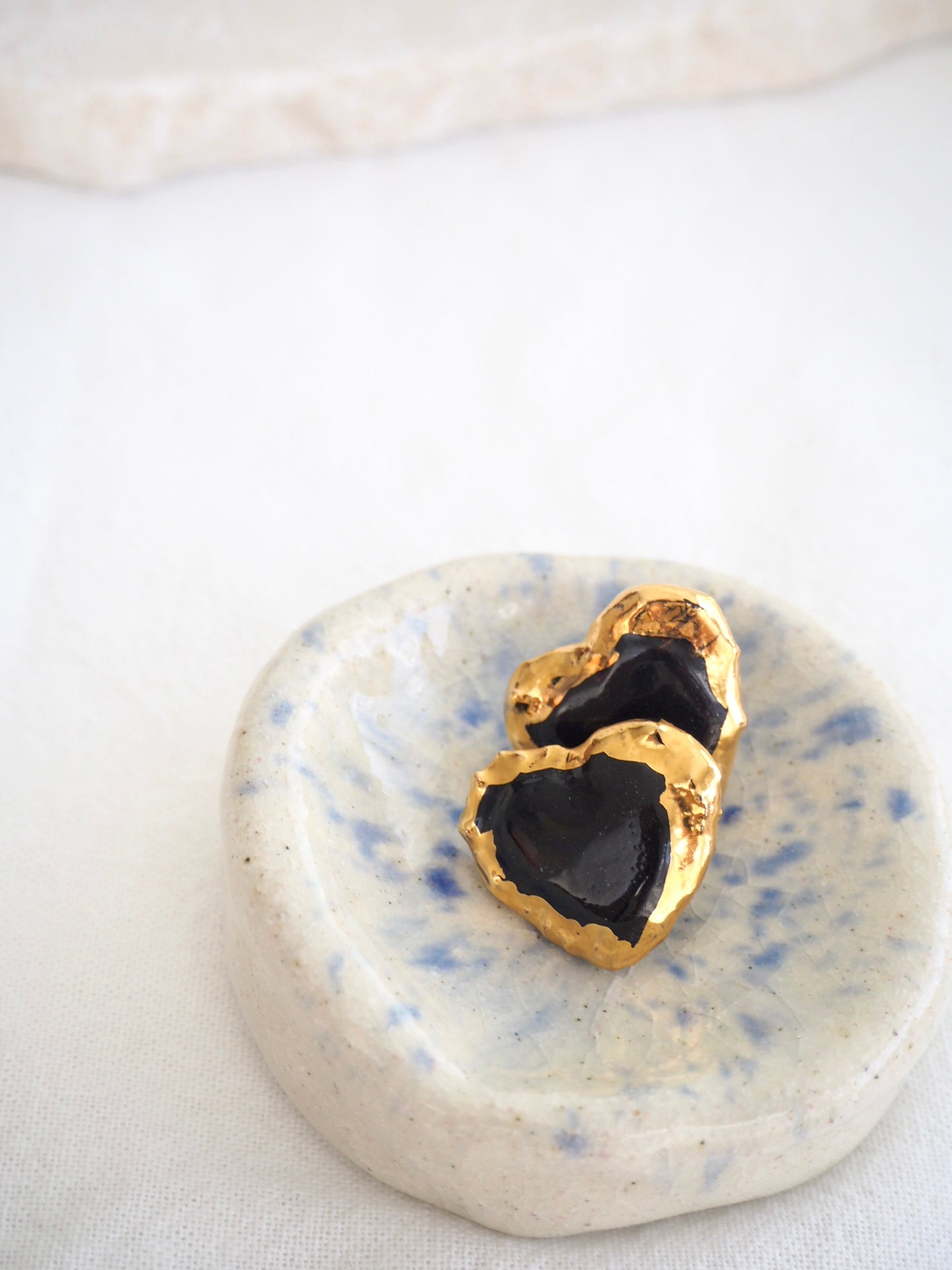 Porcelain Heart Earrings in Black coloured underglaze covered in glossy clear glaze & 24k Gold lustre rim