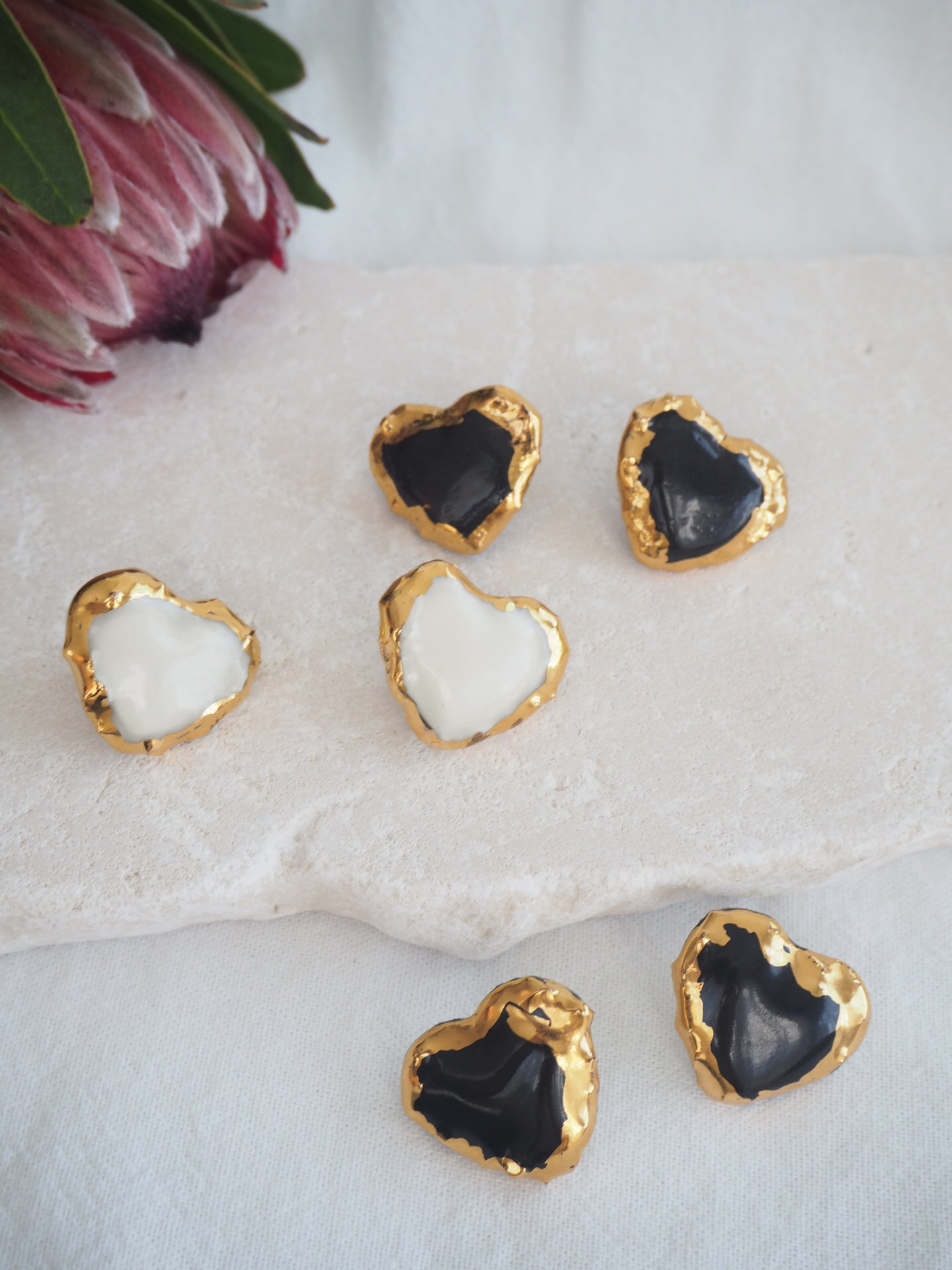 Porcelain Heart Earrings in Black coloured underglaze covered in glossy clear glaze & 24k Gold lustre rim