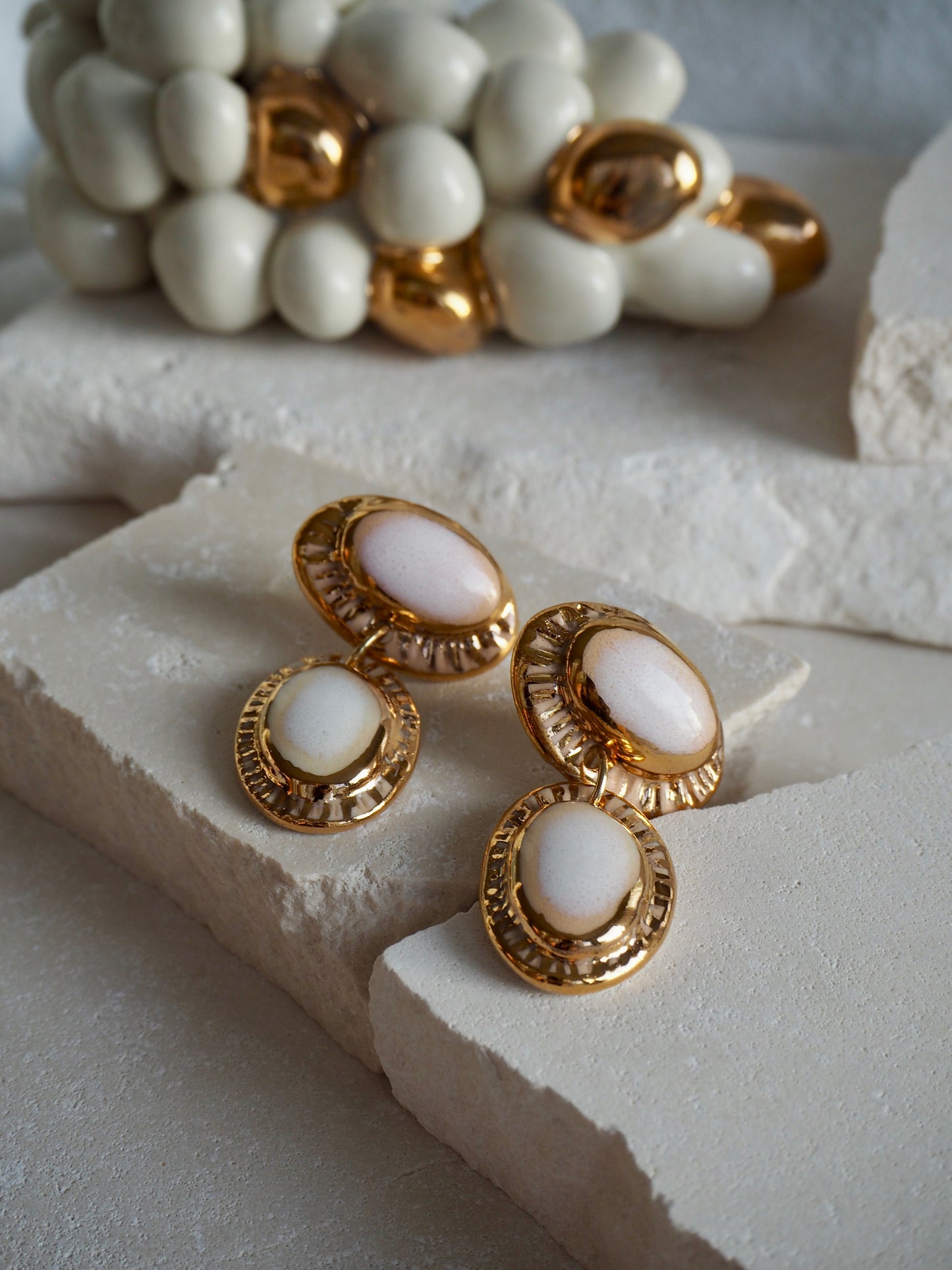 Coconut “Anima” Handmade Porcelain Earrings with Parchment underglaze under Faded White coloured glaze with 24k gold lustre rays
