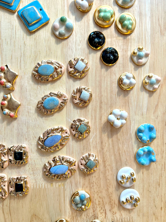 the Jocelyn collection “Conchiglia” handmade Porcelain Earrings with 24k gold lustre details