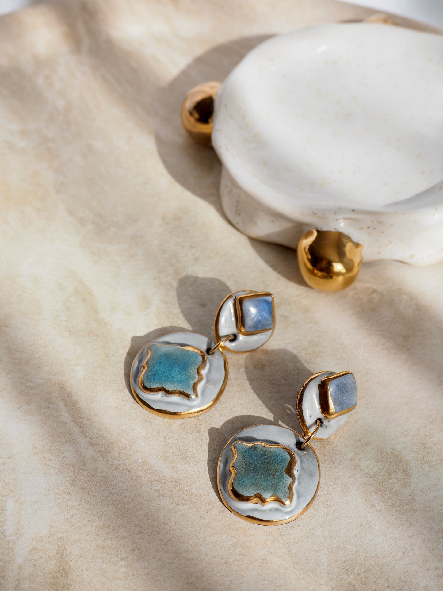 Pietra Collection handmade Black Clay Earrings coloured using green and blue glazes with 24k gold lustre details