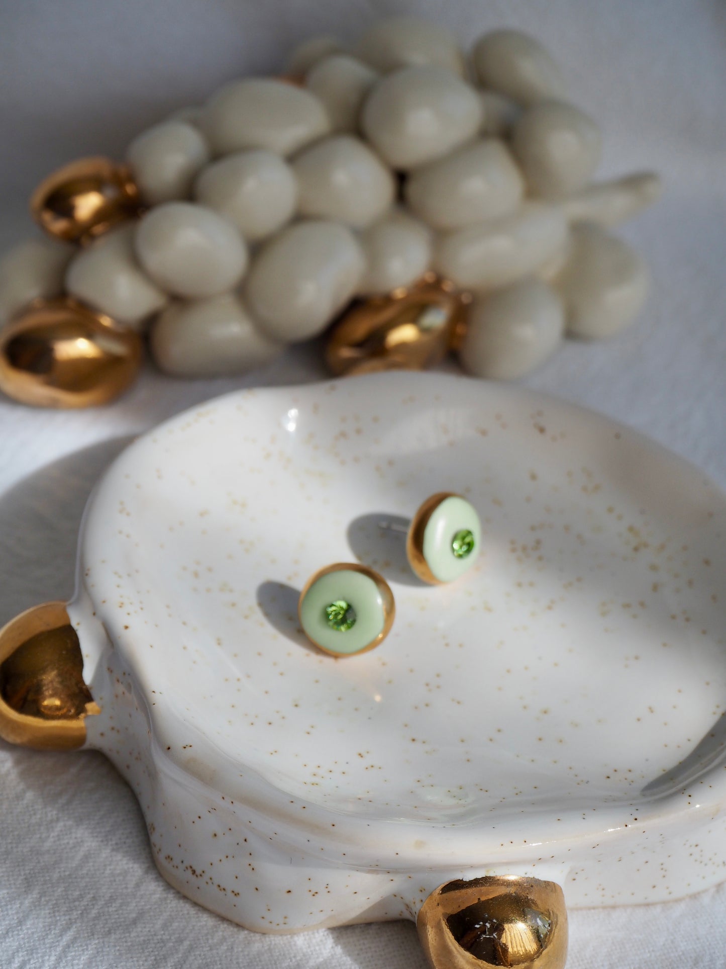 “Supernova” light Sage Green Small Handmade Porcelain Studs with 24k Gold lustre rims and Swarovskis Crystal