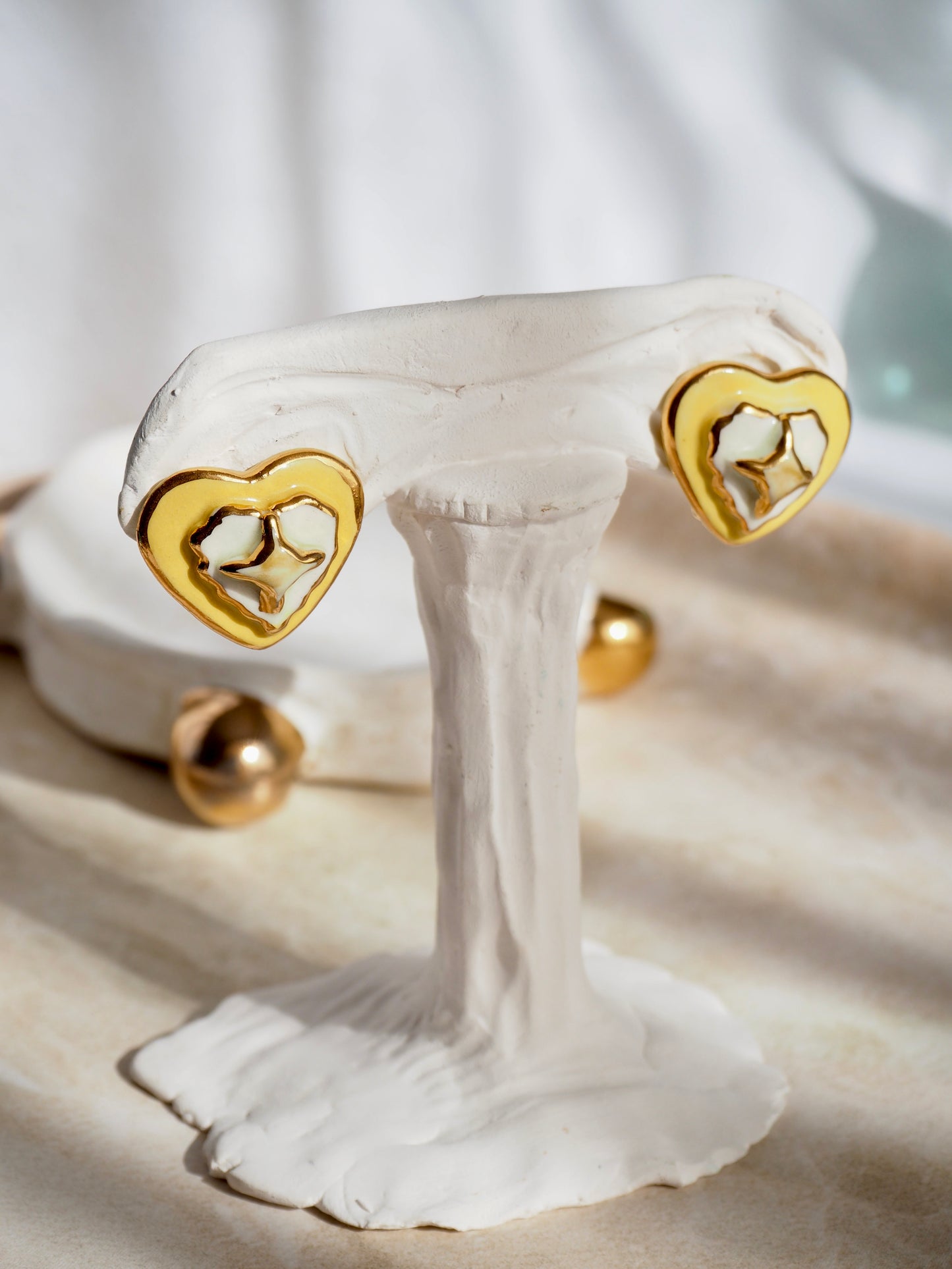 Clip-on Porcelain Heart Earrings in light Yellow & White coloured glazes with 24k Gold lustre details