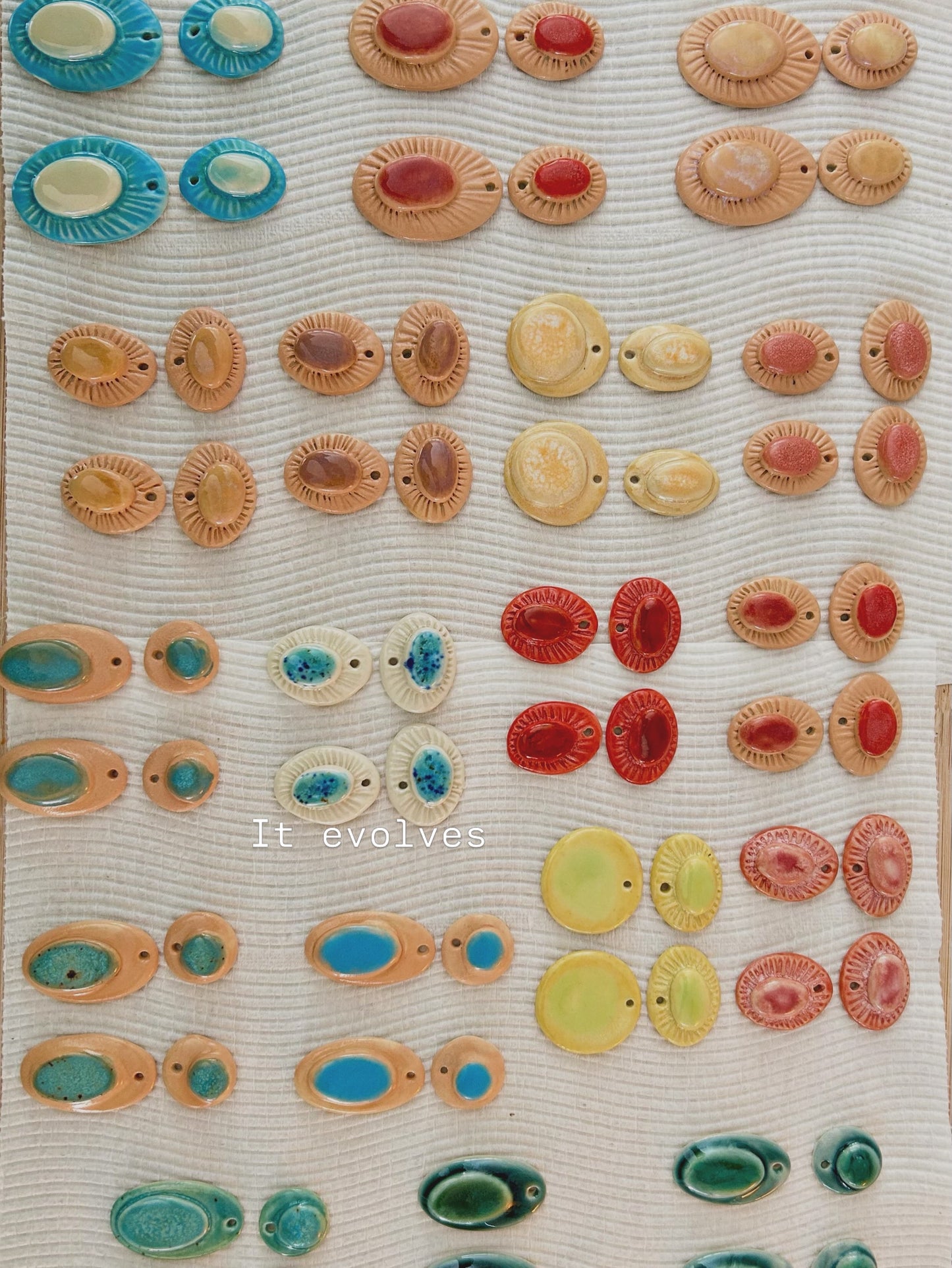 “Anima” Parchment underglaze & Shades of Pink coloured glazes with 24k gold lustre rays