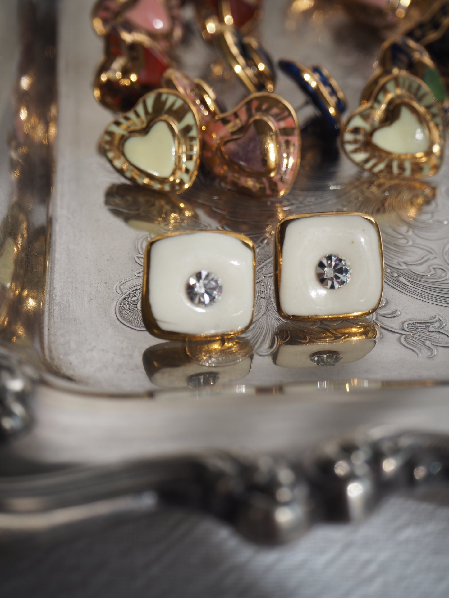 “Bigger Supernova” White Large Handmade Porcelain Studs with 24k Gold lustre rims and an Swarovskis Crystal