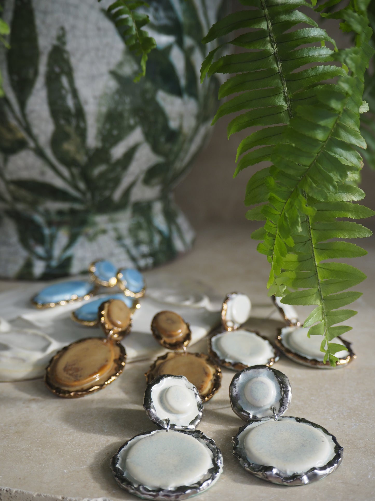 Femminilità Porcelain Earrings in “Snow” coloured glaze with Platinum lustre textured rims in a matte finish