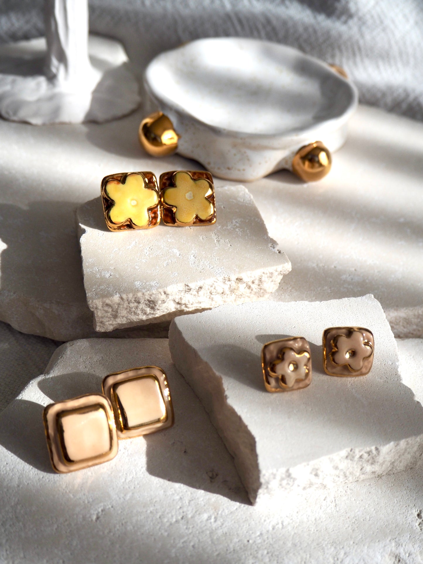 “il Quadrato” Medium Handmade Porcelain Studs coloured with “Light Beige” glossy glaze with 24k Gold lustre details