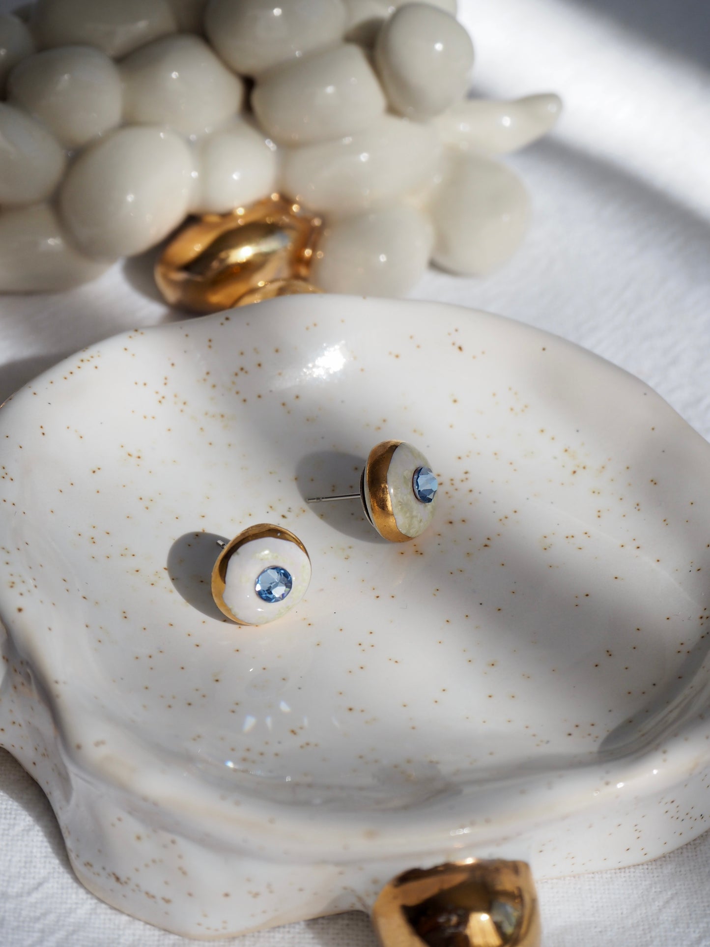 “Supernova” Cristal White  Small Handmade Porcelain Studs with 24k Gold lustre rims and Swarovskis Crystal