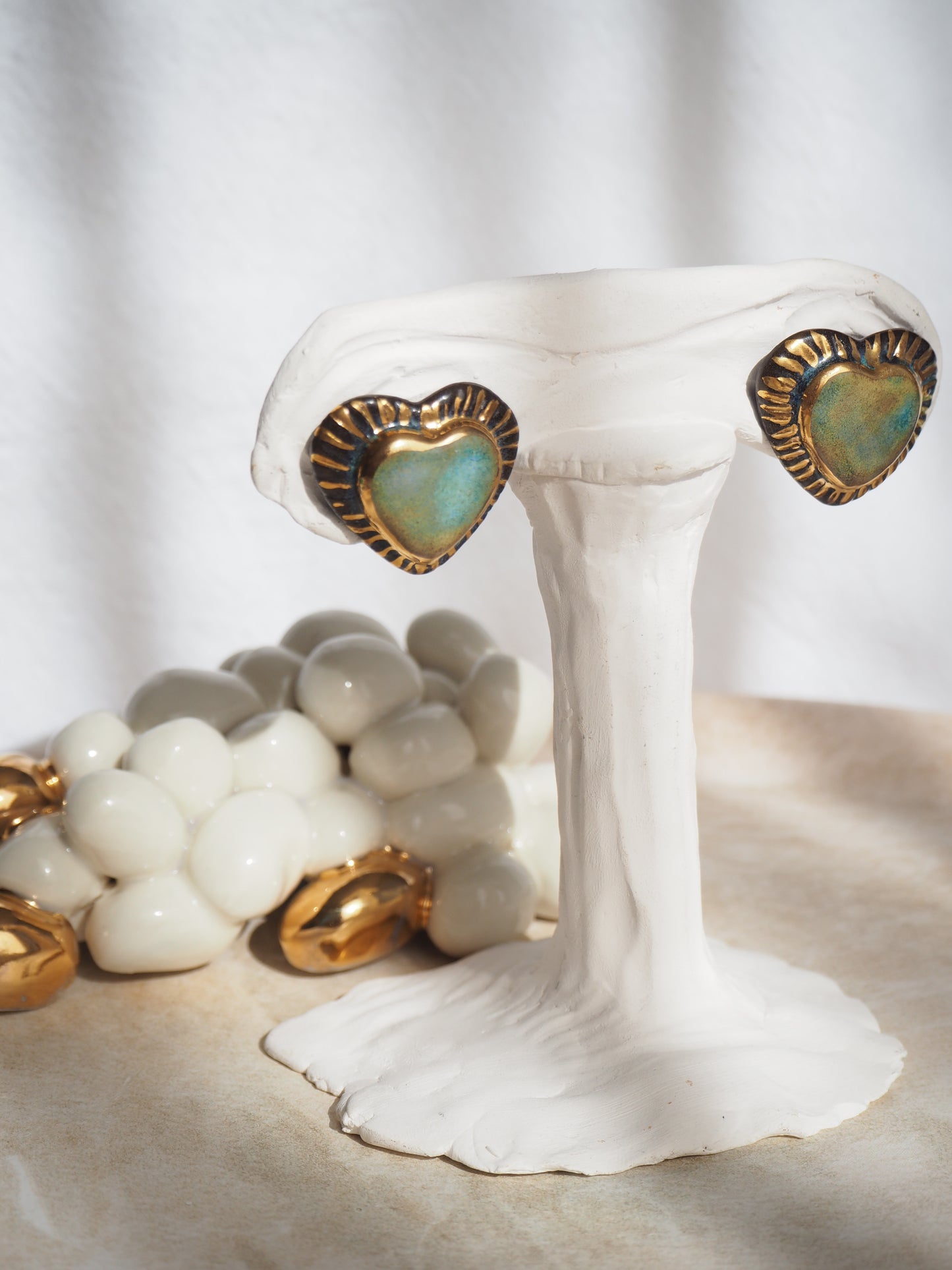 Black Clay Heart Earrings with blue glossy glazes & 24k Gold lustre rim