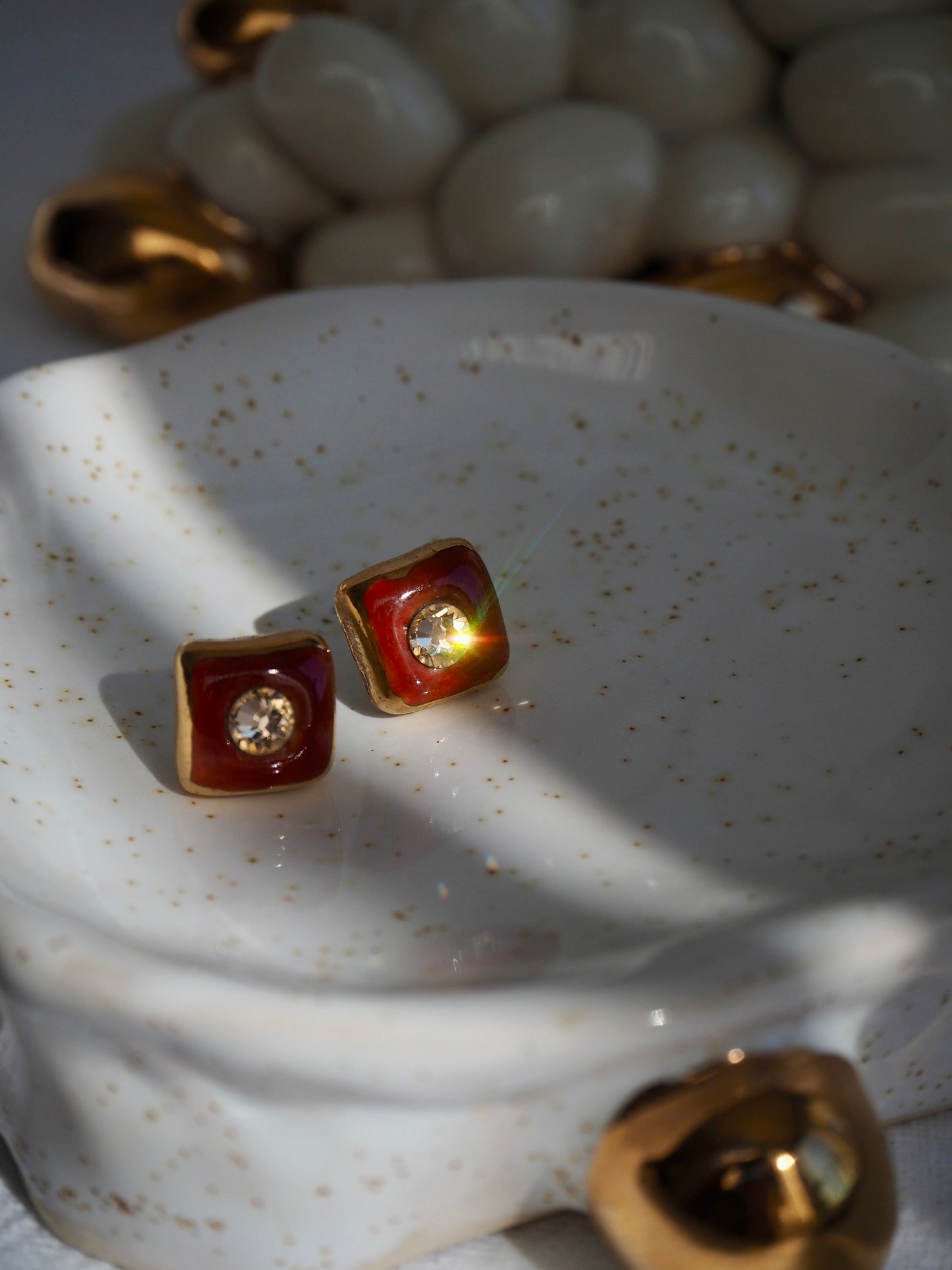 “Supernova” Brown Small Square Handmade Porcelain Studs with 24k Gold lustre rims and Swarovskis Crystal.