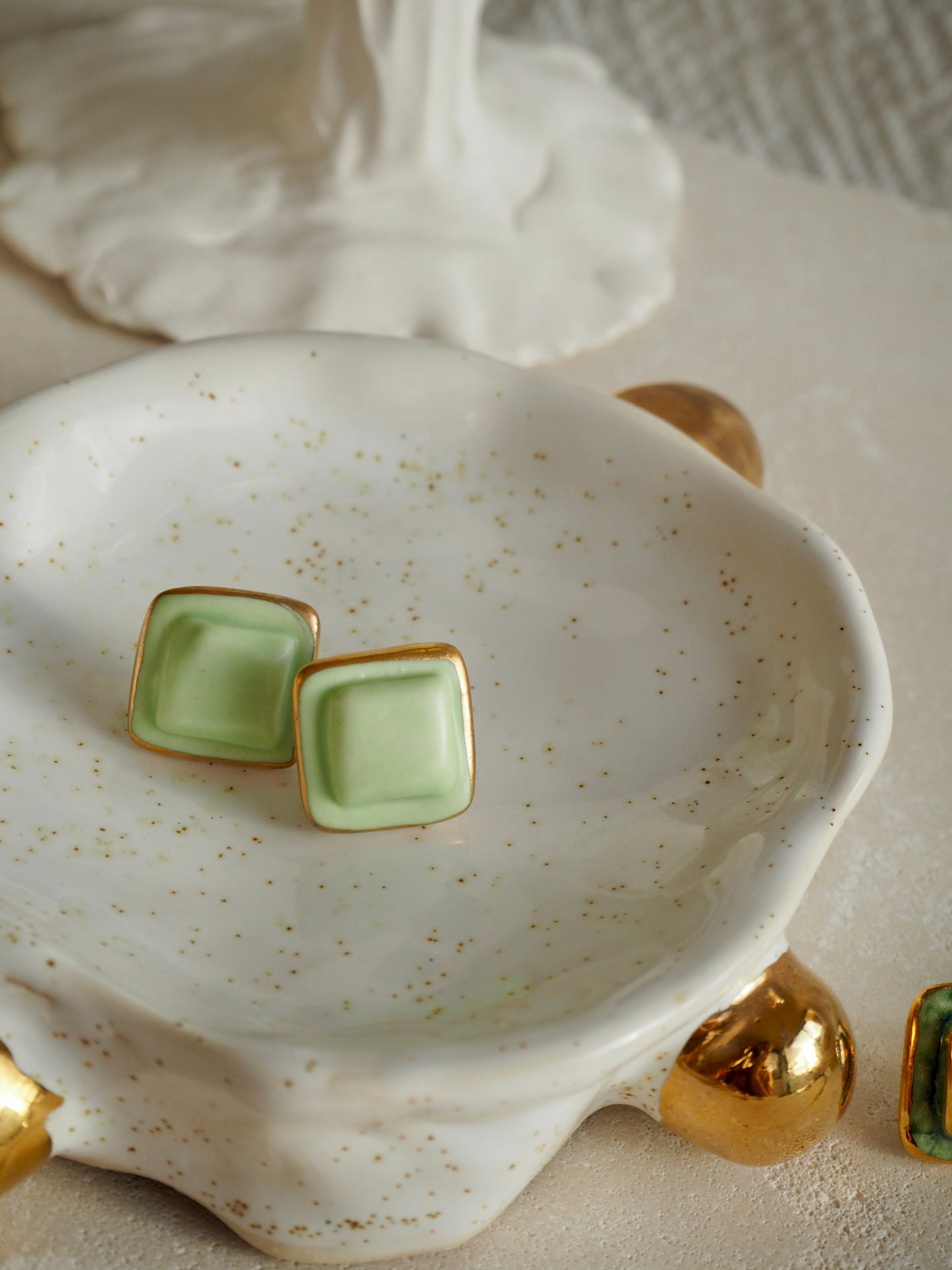“il Quadrato” Small Handmade Porcelain Studs coloured with Light Sage matt glaze with 24k Gold lustre details