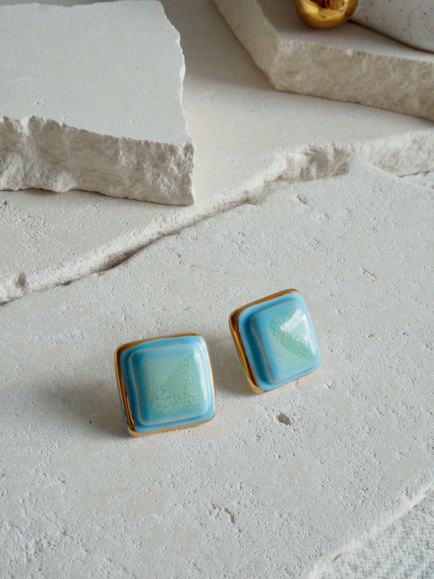 “il Quadrato” Medium Handmade Porcelain Studs coloured with “Sky Blue&Sage” glossy glazes with 24k Gold lustre details