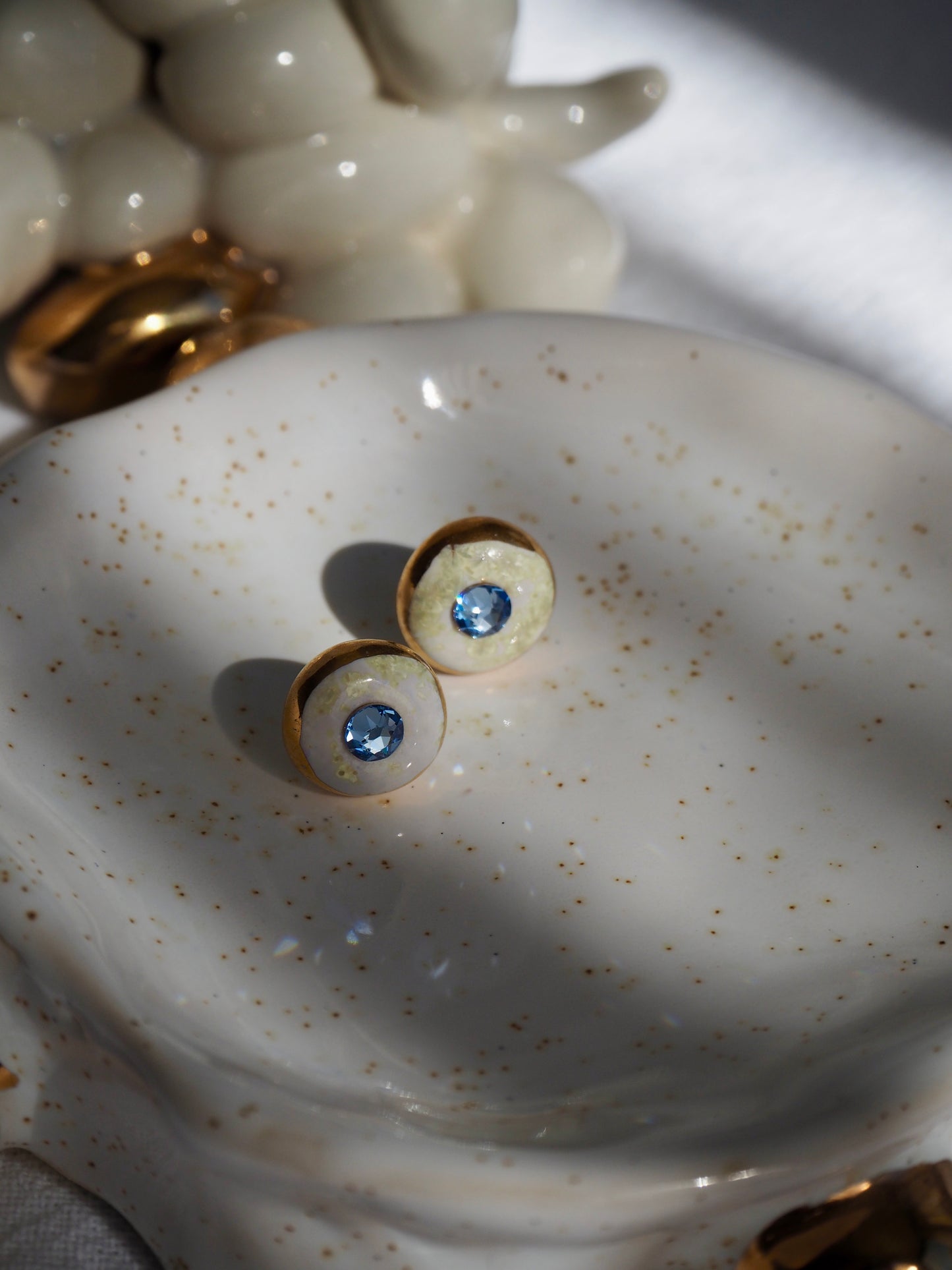 “Supernova” Cristal White  Small Handmade Porcelain Studs with 24k Gold lustre rims and Swarovskis Crystal