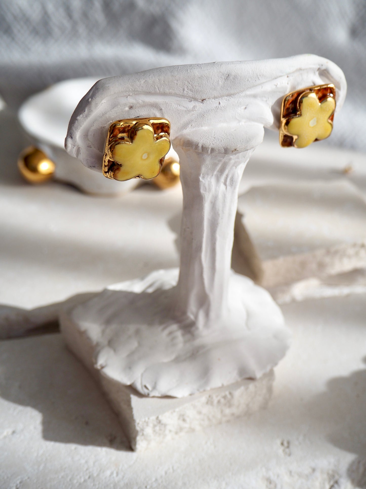 “il Quadrato” Medium Handmade Porcelain Studs coloured with “Light Beige” glossy glaze with 24k Gold lustre details