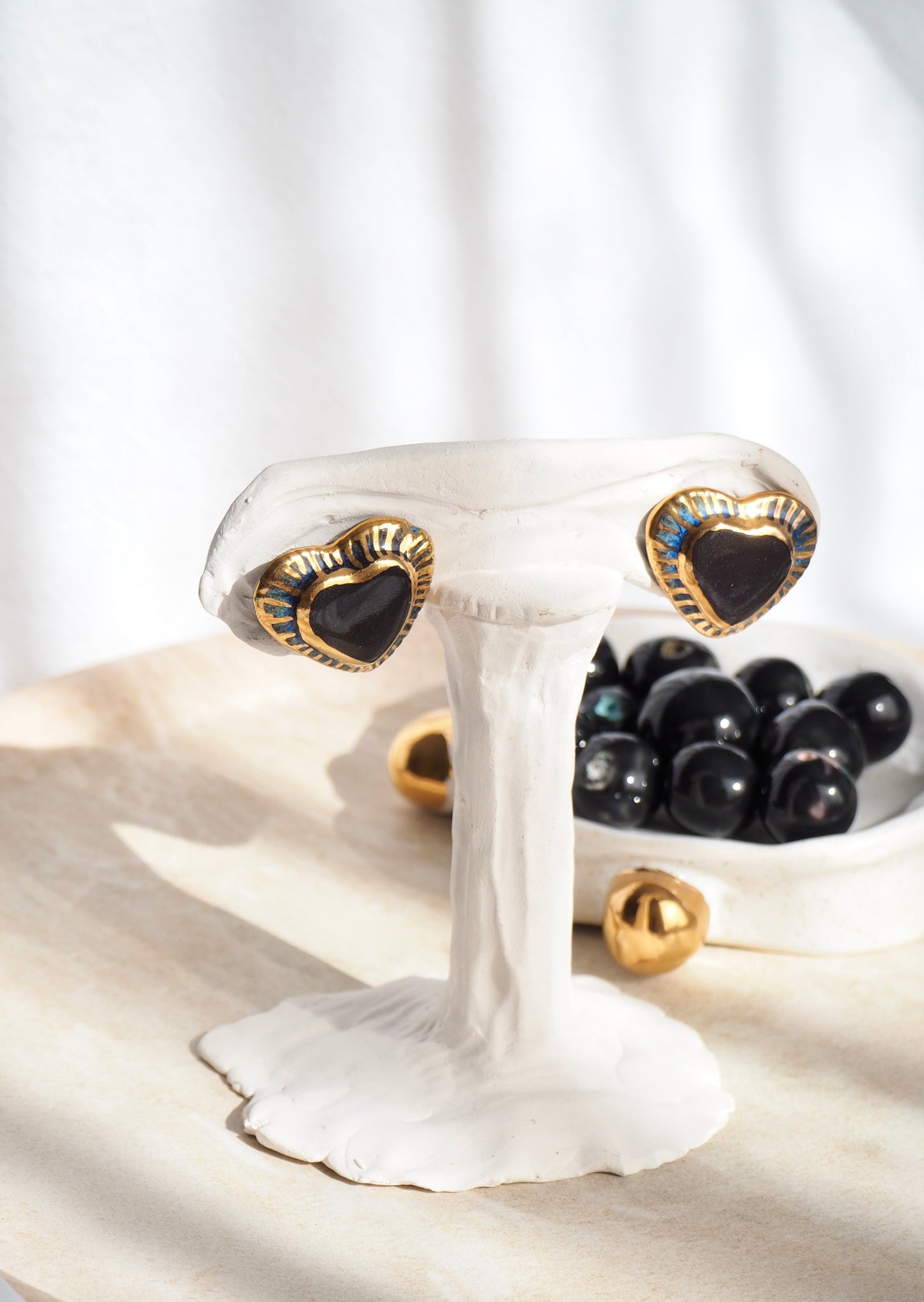 Black Clay Heart Earrings with blue glossy glazes & 24k Gold lustre rim