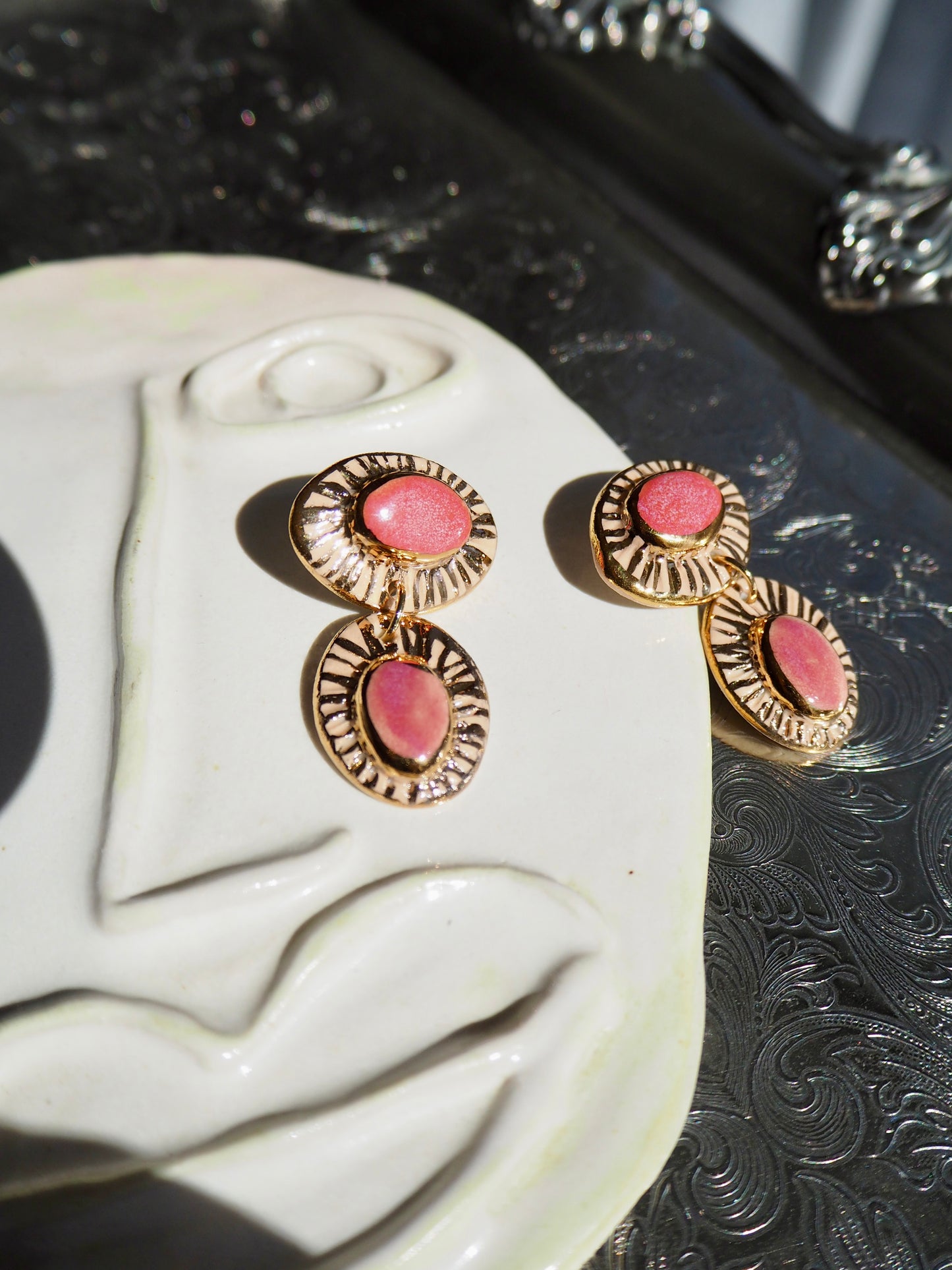 “Anima” Parchment underglaze & Shades of Pink coloured glazes with 24k gold lustre rays