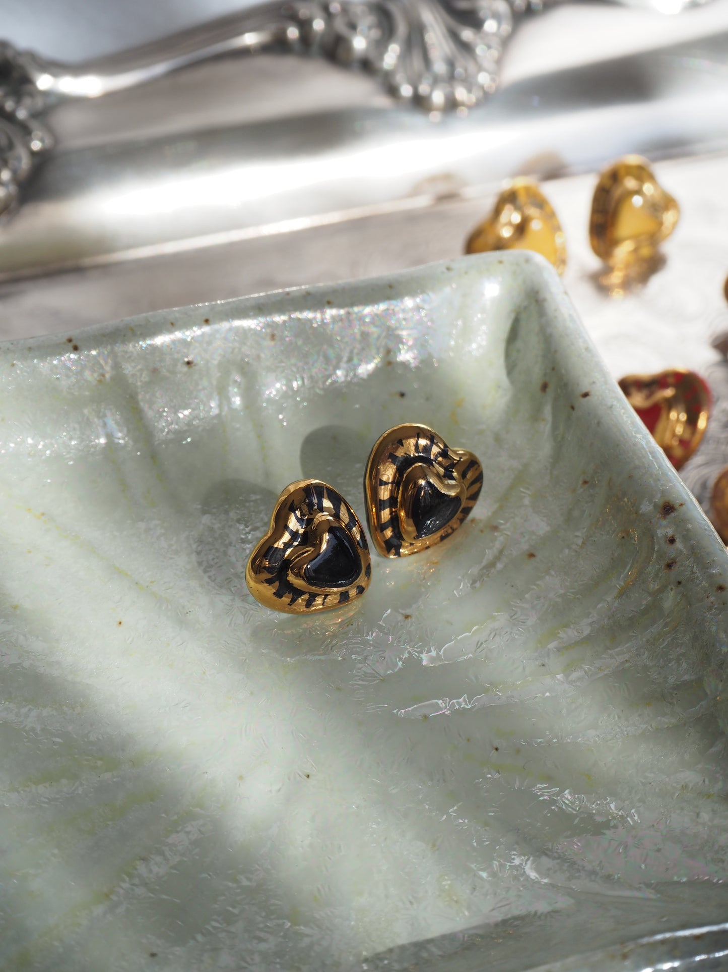 Small Handmade Porcelain Heart Stud coloured with “Black” glossy glaze with 24k Gold lustre rays