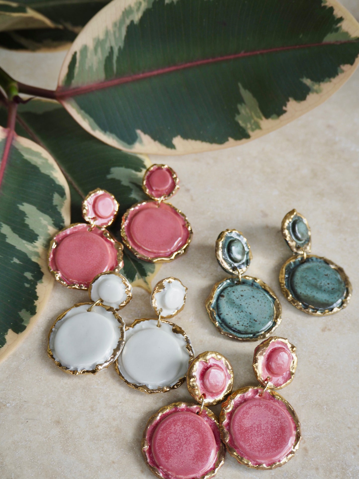 Femminilità Porcelain Earrings in a “green speckled ash” coloured glaze with 24k Gold lustre textured rims