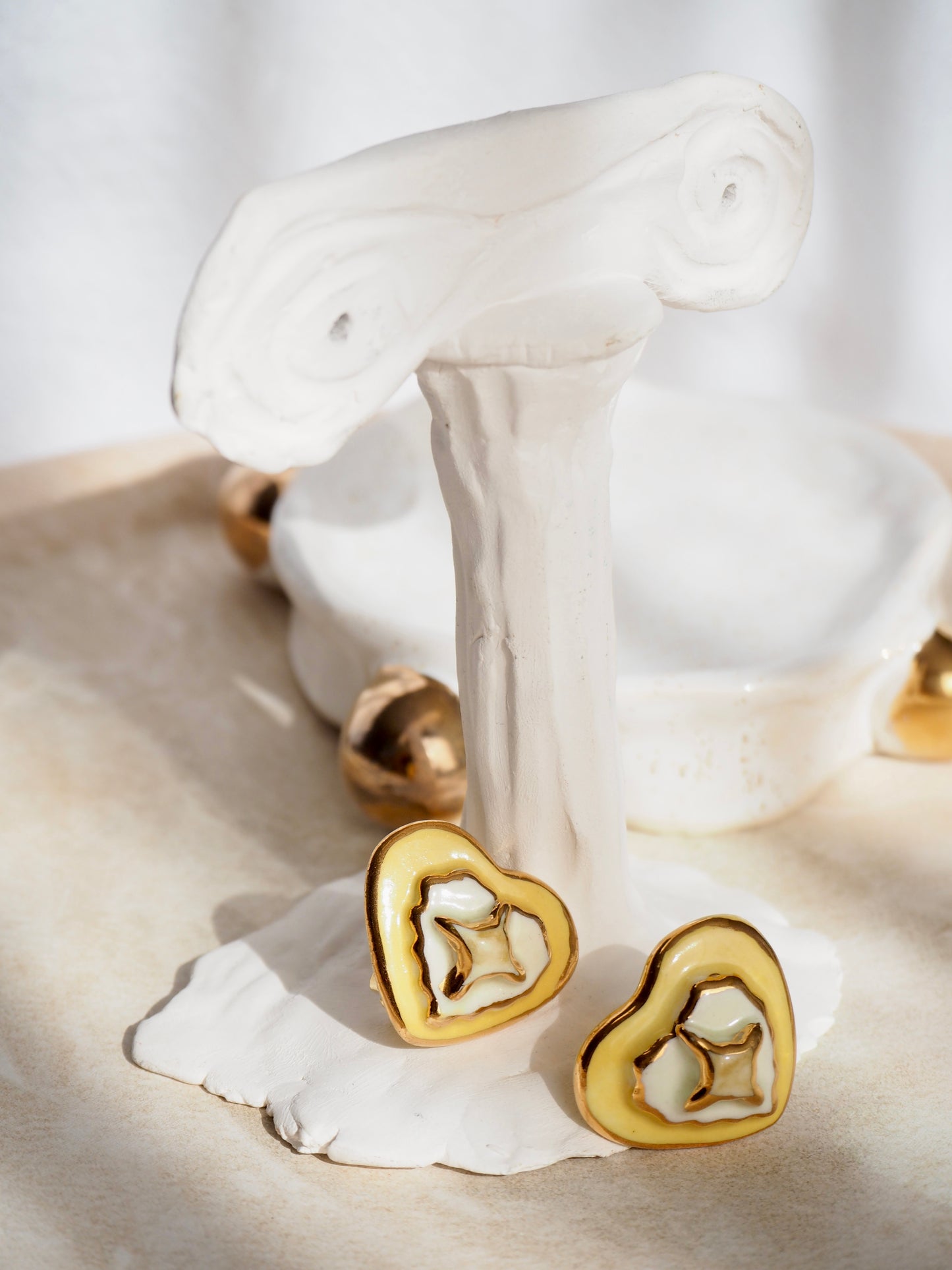 Clip-on Porcelain Heart Earrings in light Yellow & White coloured glazes with 24k Gold lustre details