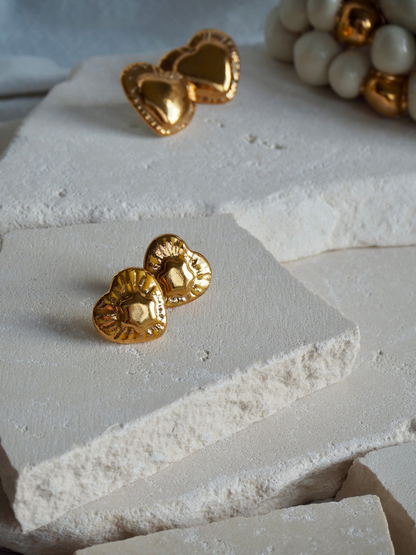 Small Handmade Porcelain Heart Stud Earrings coloured with glossy Yellow glaze with 24k Gold lustre details and Gold center Star
