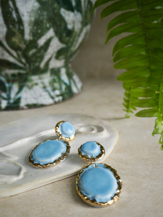 Femminilità Porcelain Earrings in “light Blue” coloured glossy glaze with 24k Gold lustre textured rims