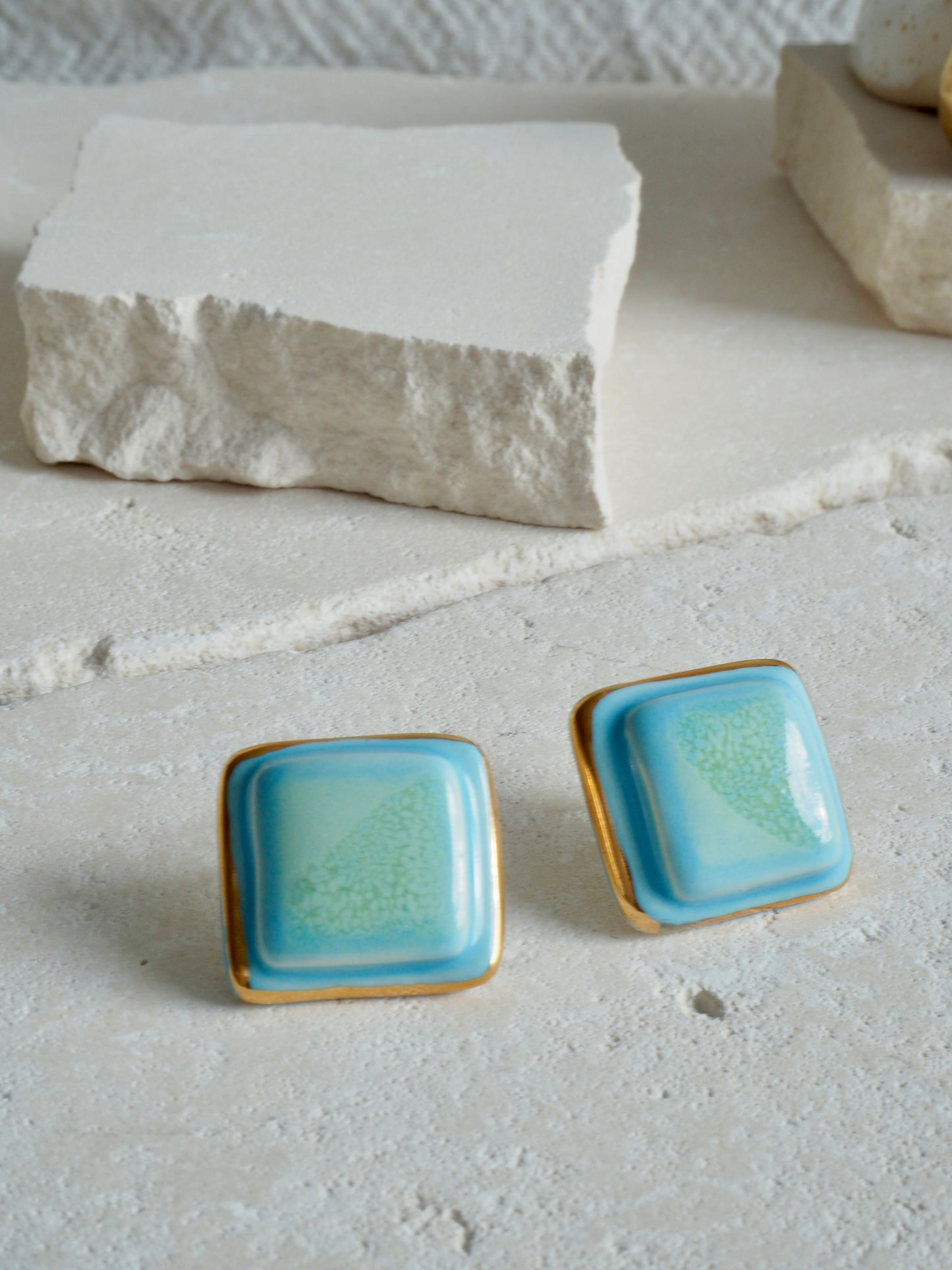 “il Quadrato” Medium Handmade Porcelain Studs coloured with “Sky Blue&Sage” glossy glazes with 24k Gold lustre details