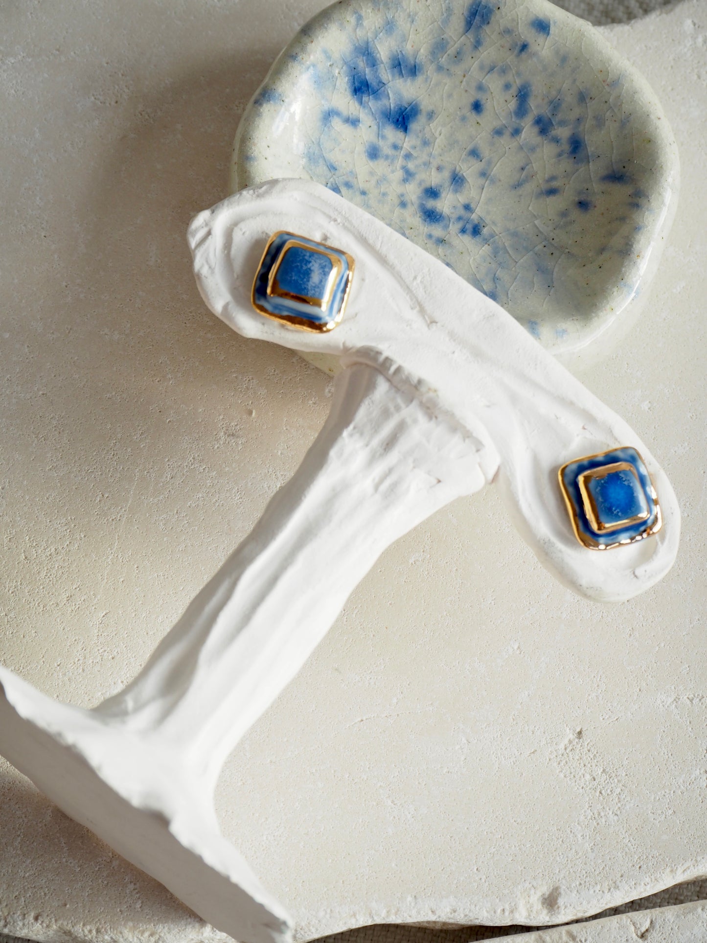 “il Quadrato” Small Handmade Porcelain Studs coloured with Dark Blue glossy glaze with 24k Gold lustre details