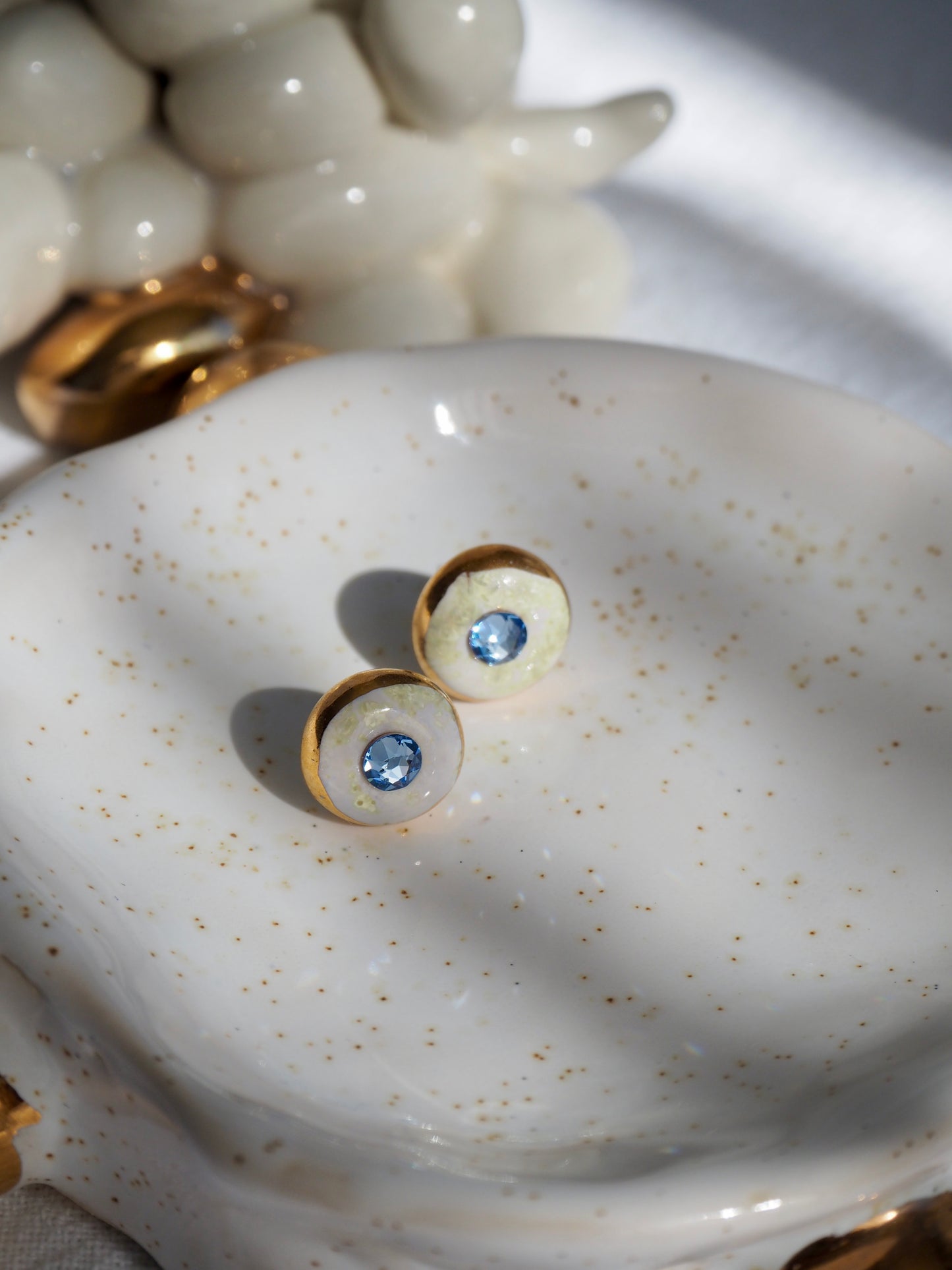 “Supernova” Cristal White  Small Handmade Porcelain Studs with 24k Gold lustre rims and Swarovskis Crystal