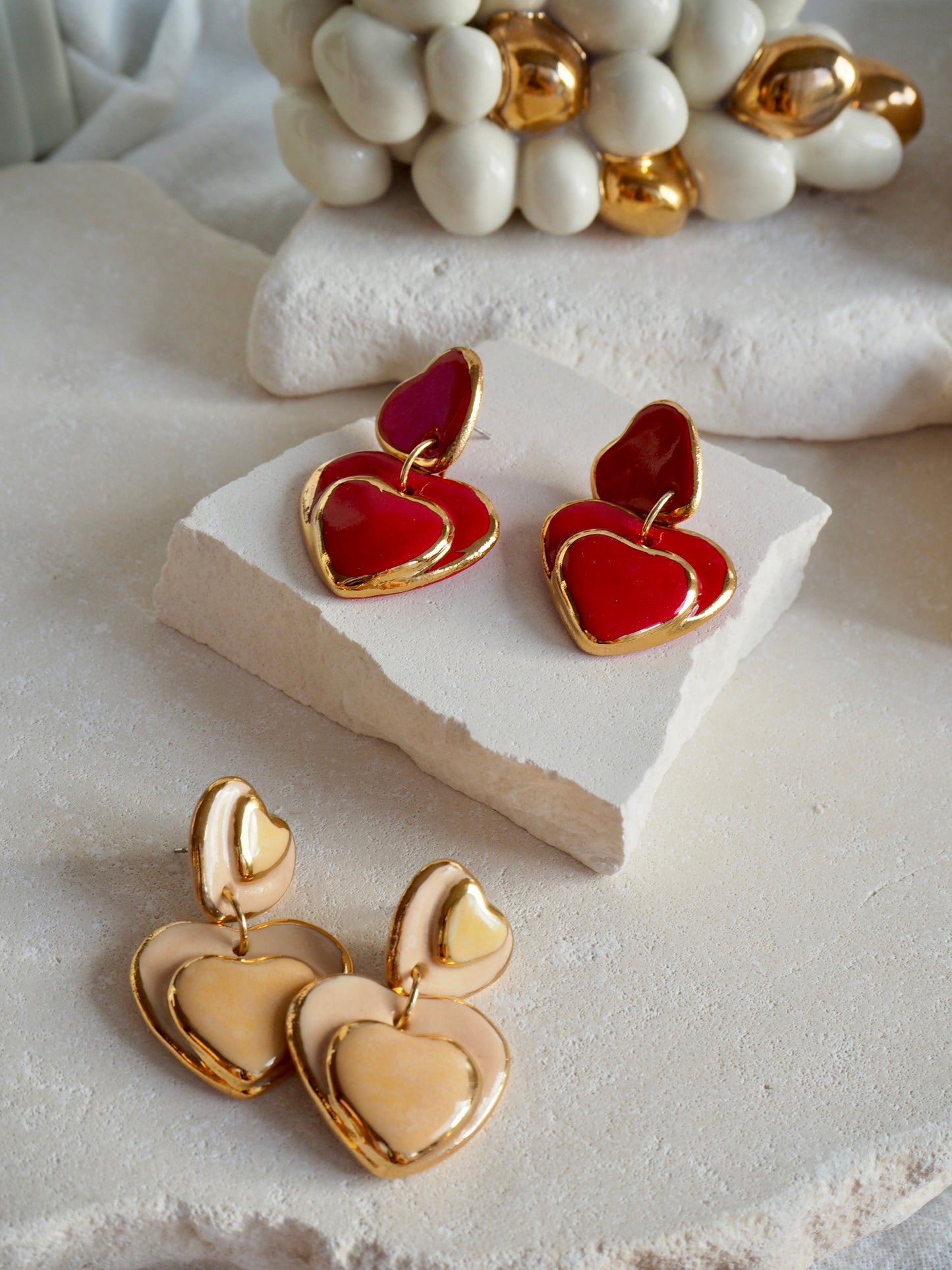 Handmade Porcelain Heart Earrings faded Yellow Hearts on Parchment underglaze glaze with 24k Gold lustre rims