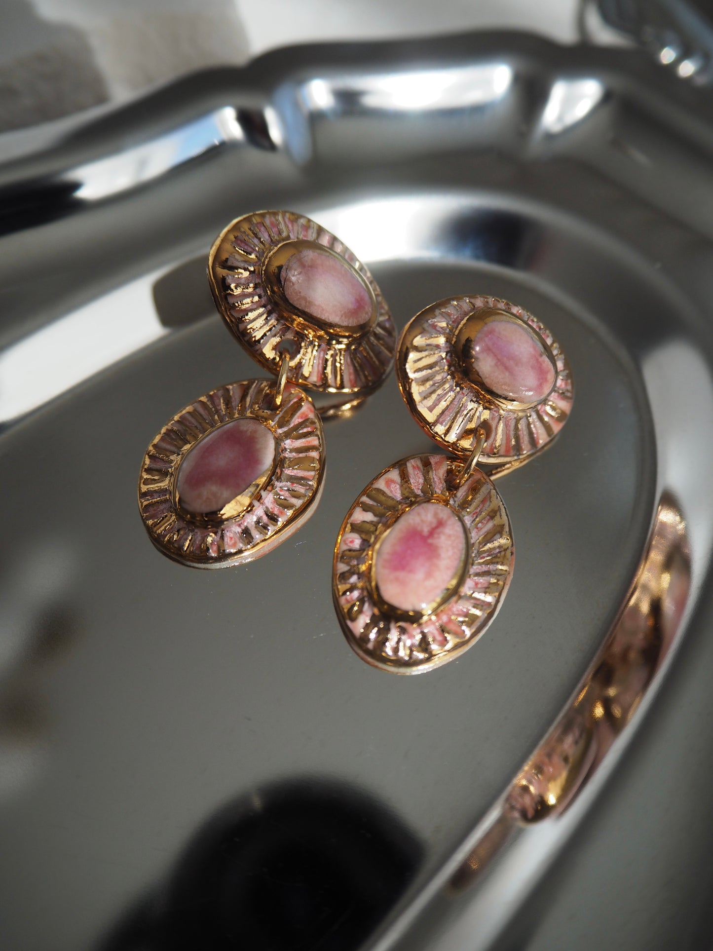 “Anima” Fused Pink coloured glazes creating a Marbled look with 24k gold lustre rays